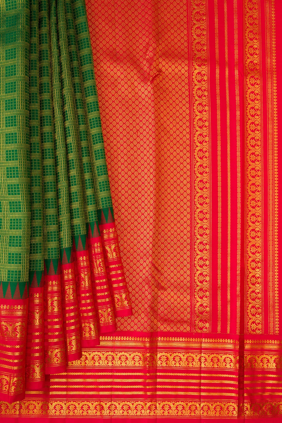 Pleats and pallu of Pure Silk Green Kanjivaram Saree with Zari Brocade on the body and Fancy Border. 