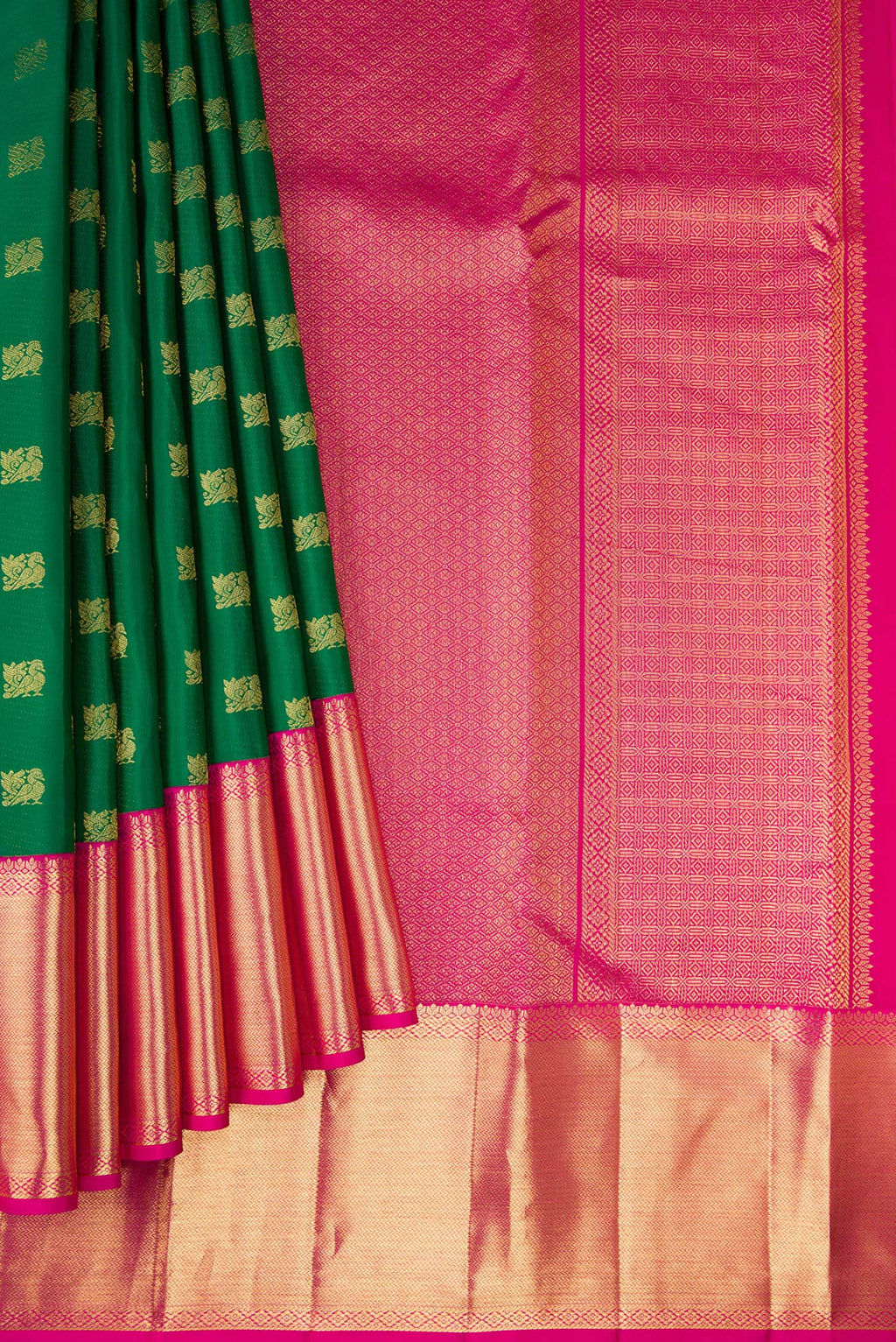 Pleats and pallu of Green Kanjivaram Silk Saree with Zari Butta on the body and Zari Border. 