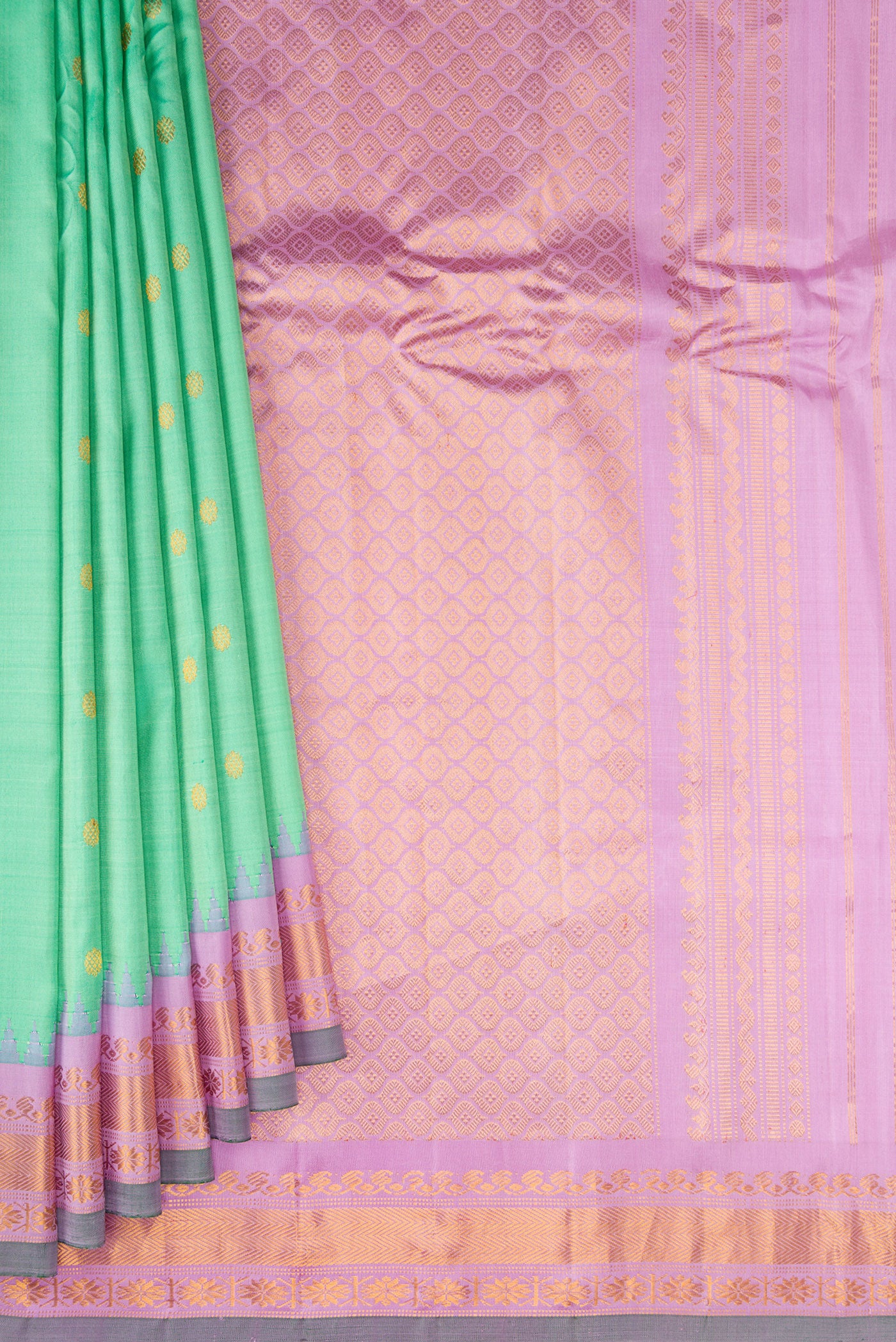 Pleats and pallu of Sea Green Gadwal Silk Saree with Zari Butta on the body and Zari Border. 