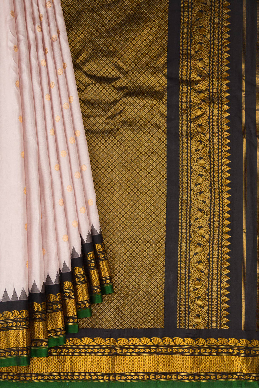 Pleats and pallu of Rose Gold Gadwal Silk Saree with Zari Butta on the body and Temple Border. 