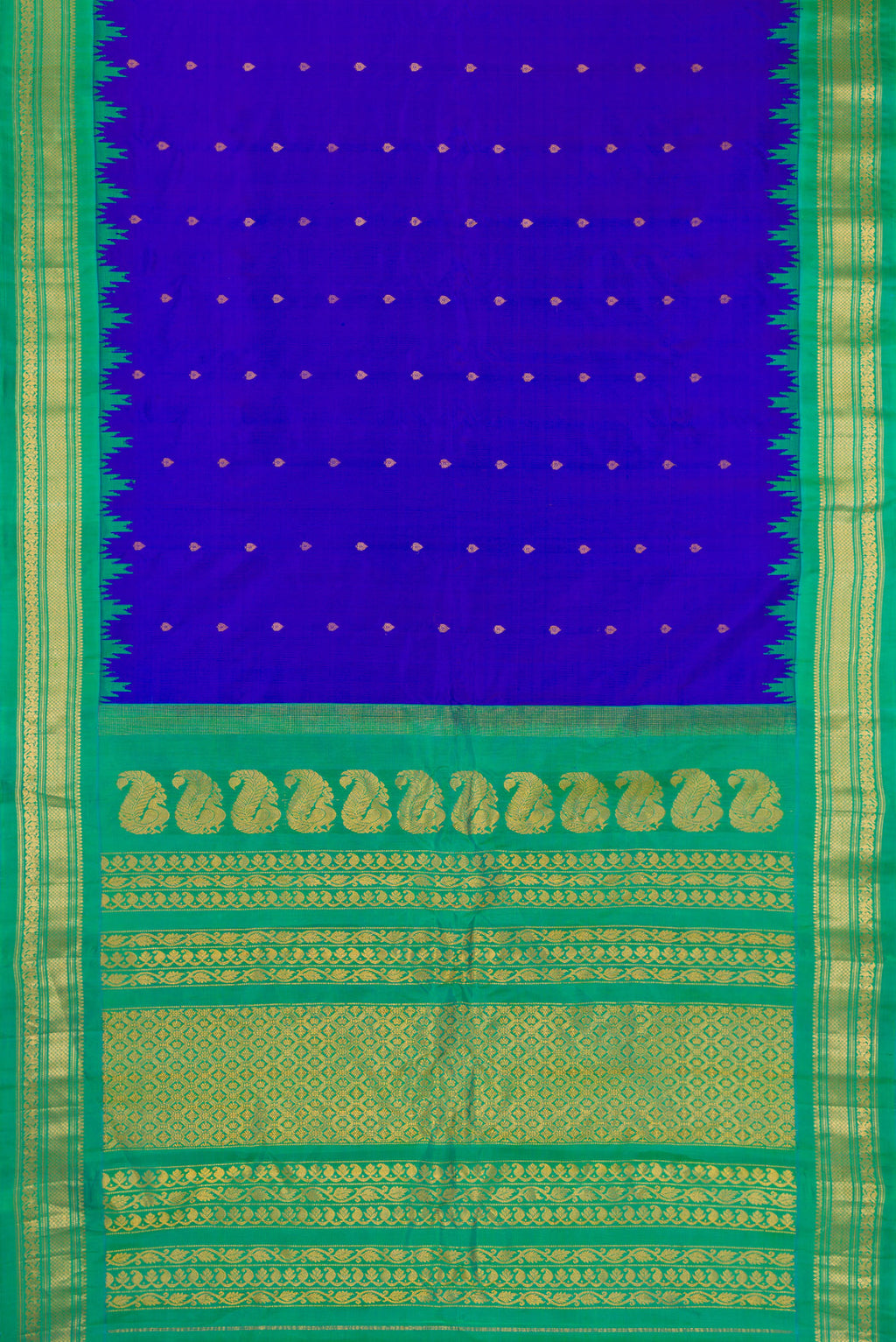 Flat view of Royal Blue Gadwal Silk Saree with Zari Butta on the body and Temple Border. 