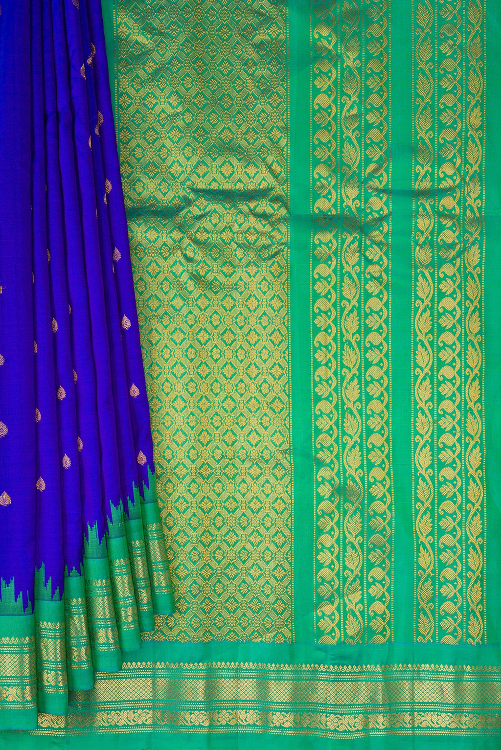 Pleats and pallu of Royal Blue Gadwal Silk Saree with Zari Butta on the body and Temple Border. 