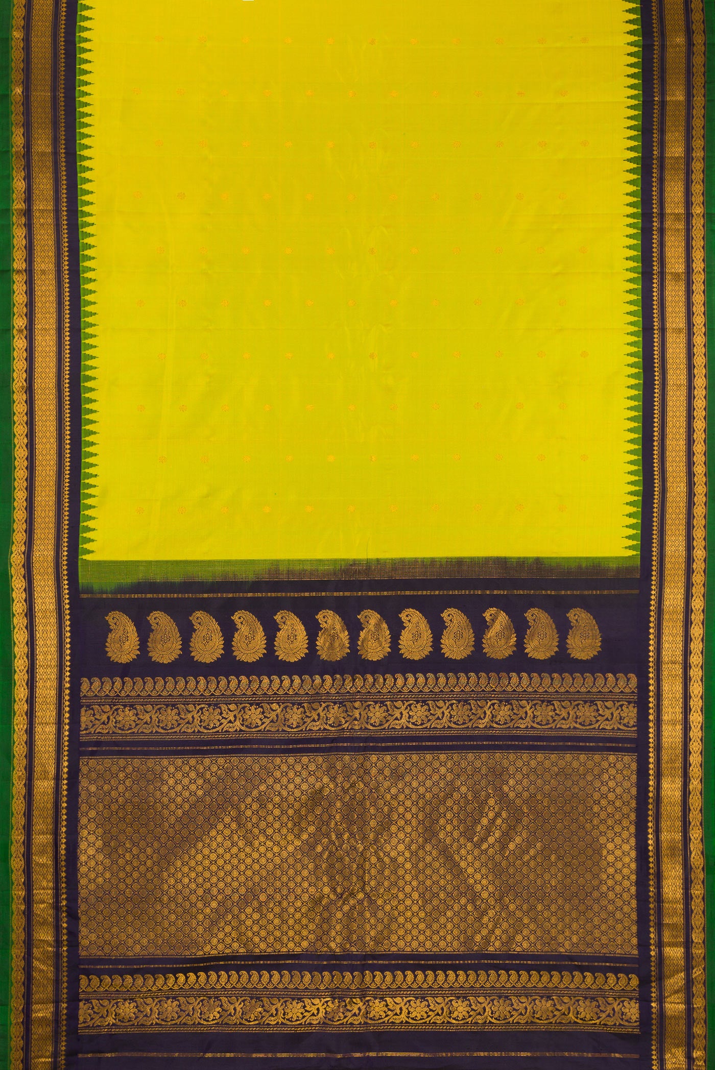 Flat view of Parrot Green Gadwal Silk Saree with Zari Butta on the body and Temple Border. 
