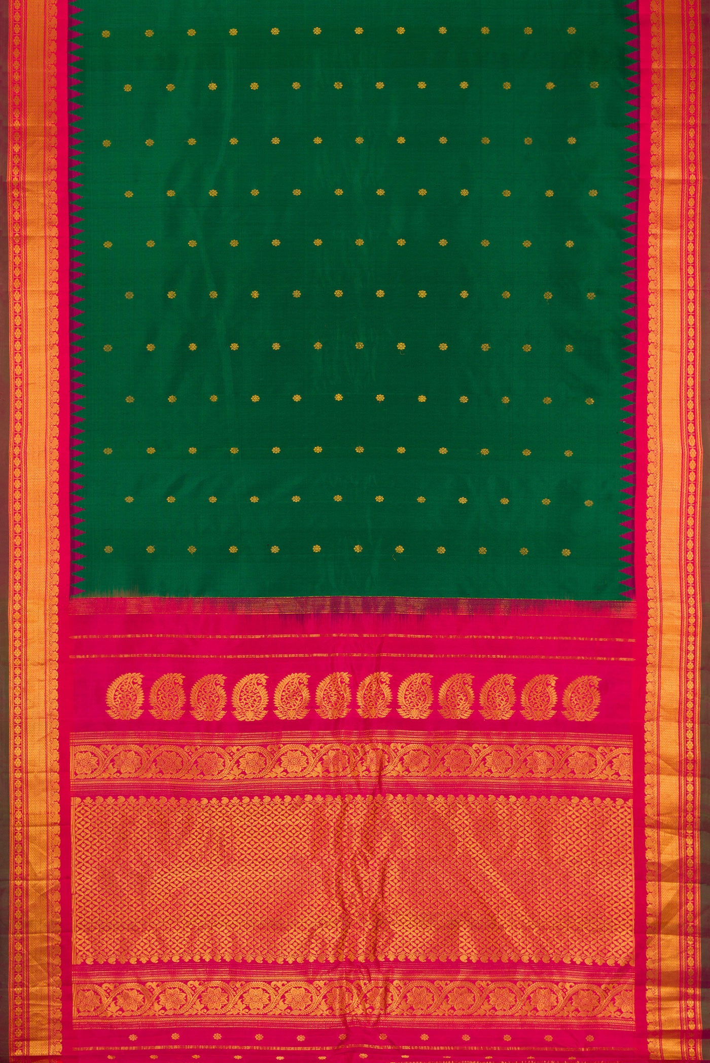 Flat view of Bottle Green Gadwal Silk Saree with Zari Butta on the body and Temple Border. 