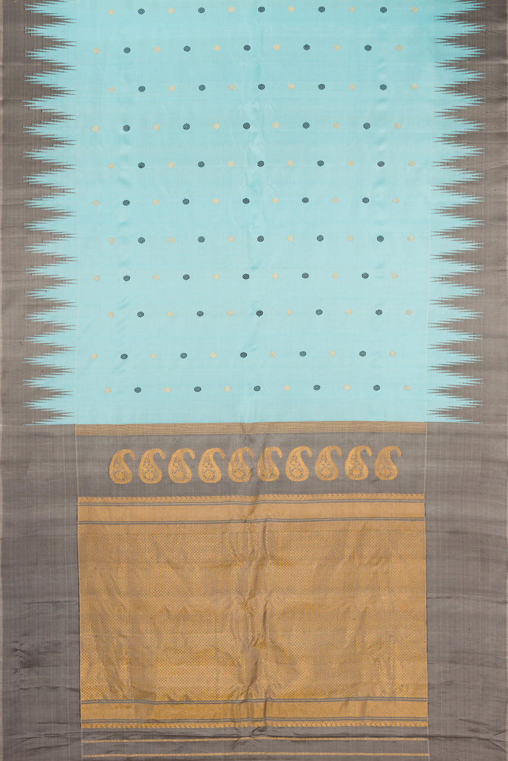 Flat view of Sky Blue Gadwal Silk Saree with Zari And Thread Butta on the body and Temple Border. 