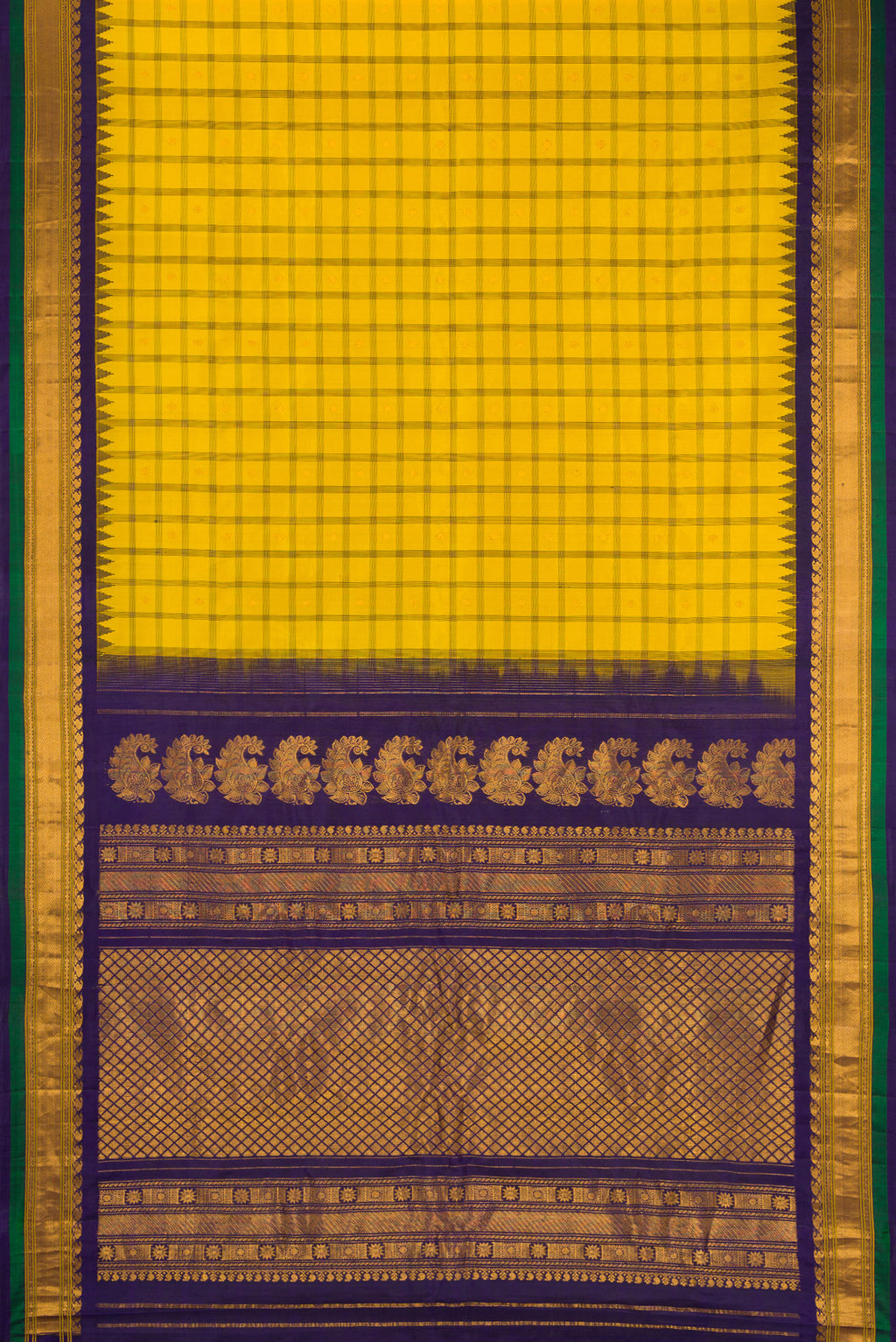 Flat view of Yellow Gadwal Silk Saree with Checked design on the body and Temple Border. 