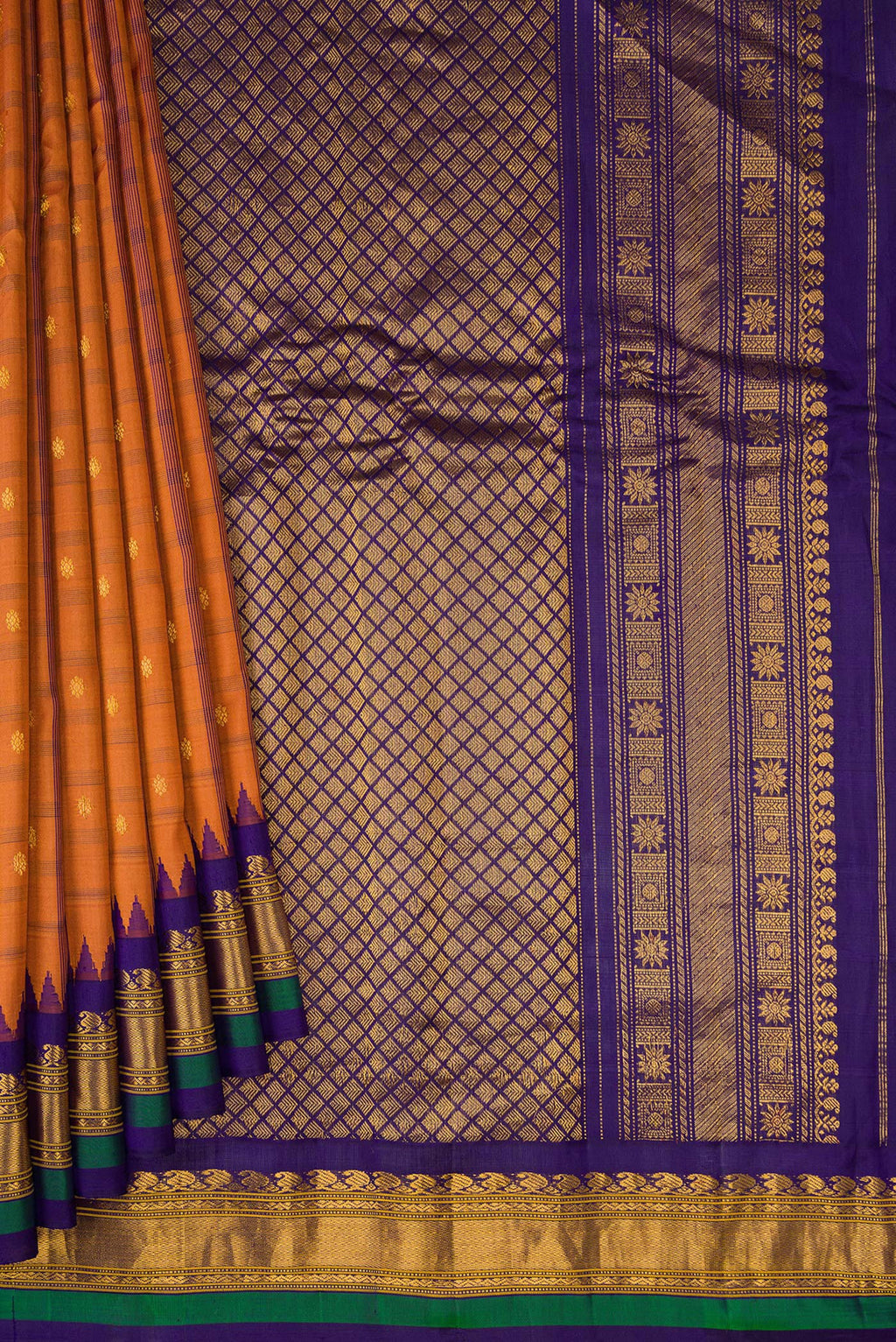 Pleats and pallu of Brick Orange Gadwal Silk Saree with Checked design on the body and Zari Border. 
