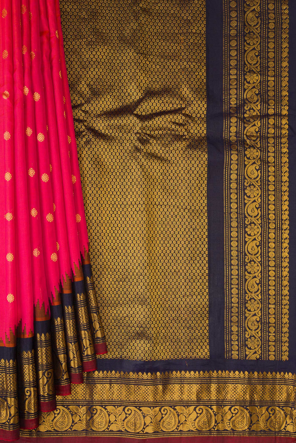 Pleats and pallu of Dark Pink Dual Tone Gadwal Silk Saree with Zari Butta on the body and Zari Border. 