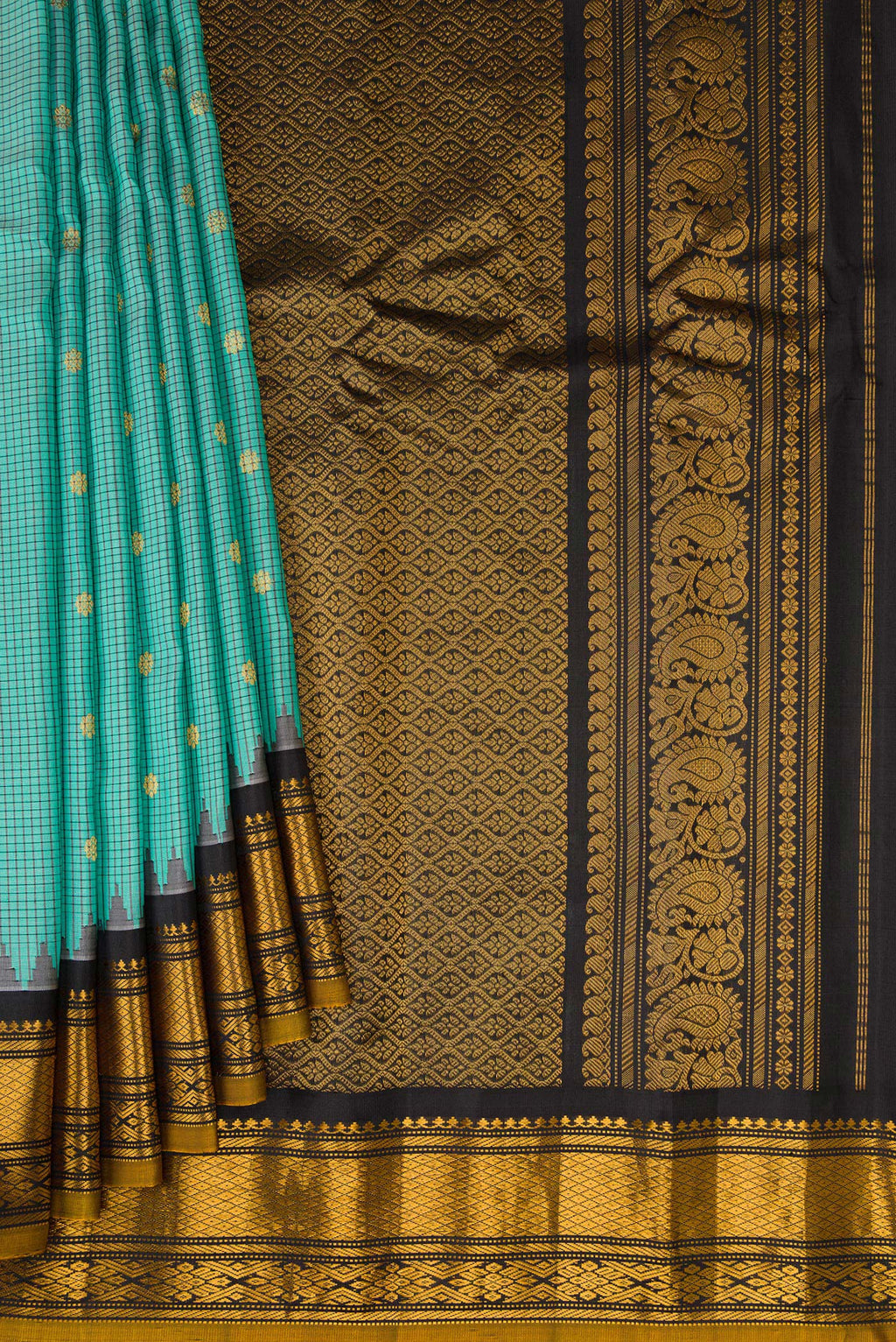 Pleats and pallu of Sea Green Gadwal Silk Saree with Checked design on the body and Temple Border. 