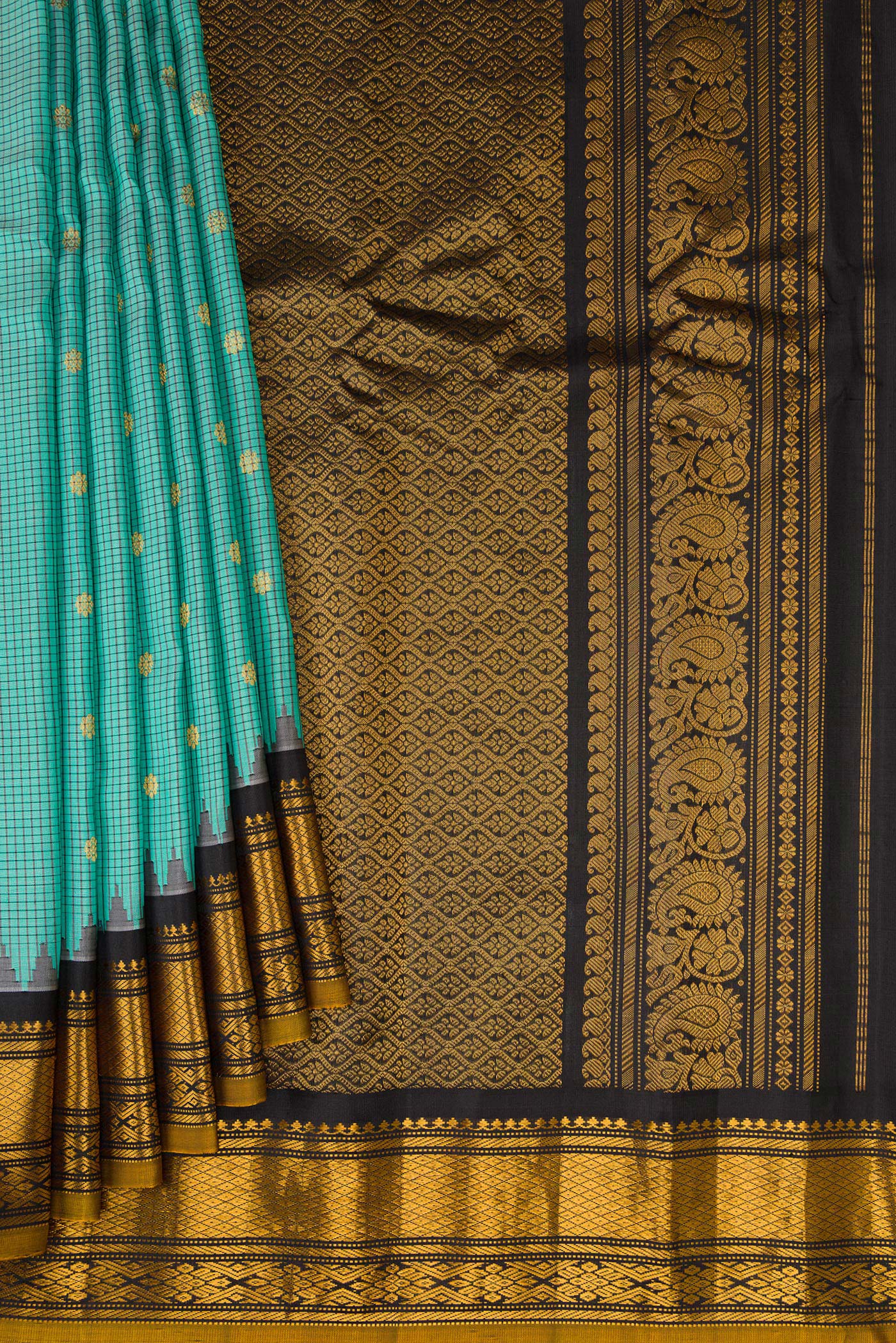 Pleats and pallu of Sea Green Gadwal Silk Saree with Checked design on the body and Temple Border. 