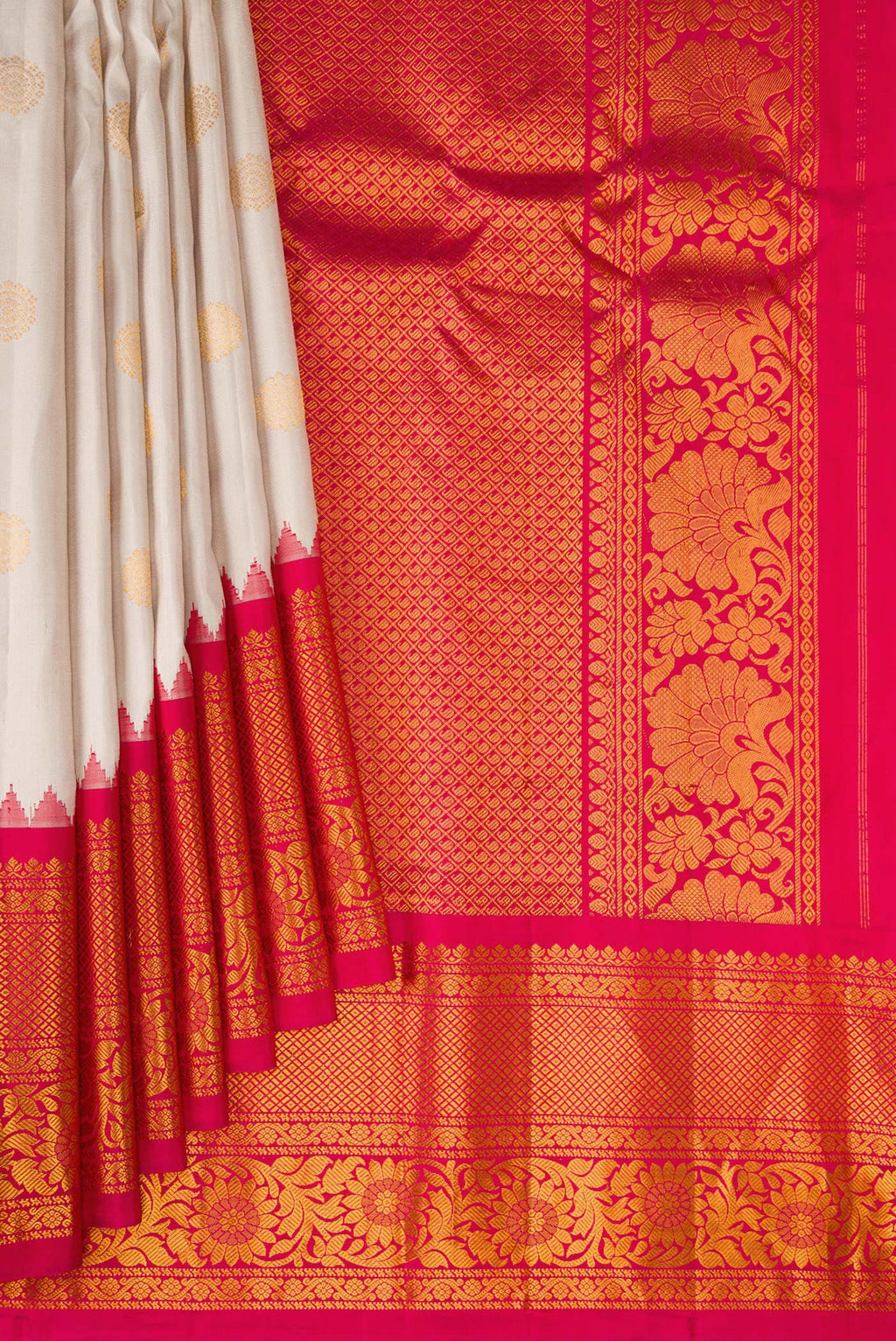 Pleats and pallu of Dark Beige Gadwal Silk Saree with Zari Butta on the body and Fancy Border. 