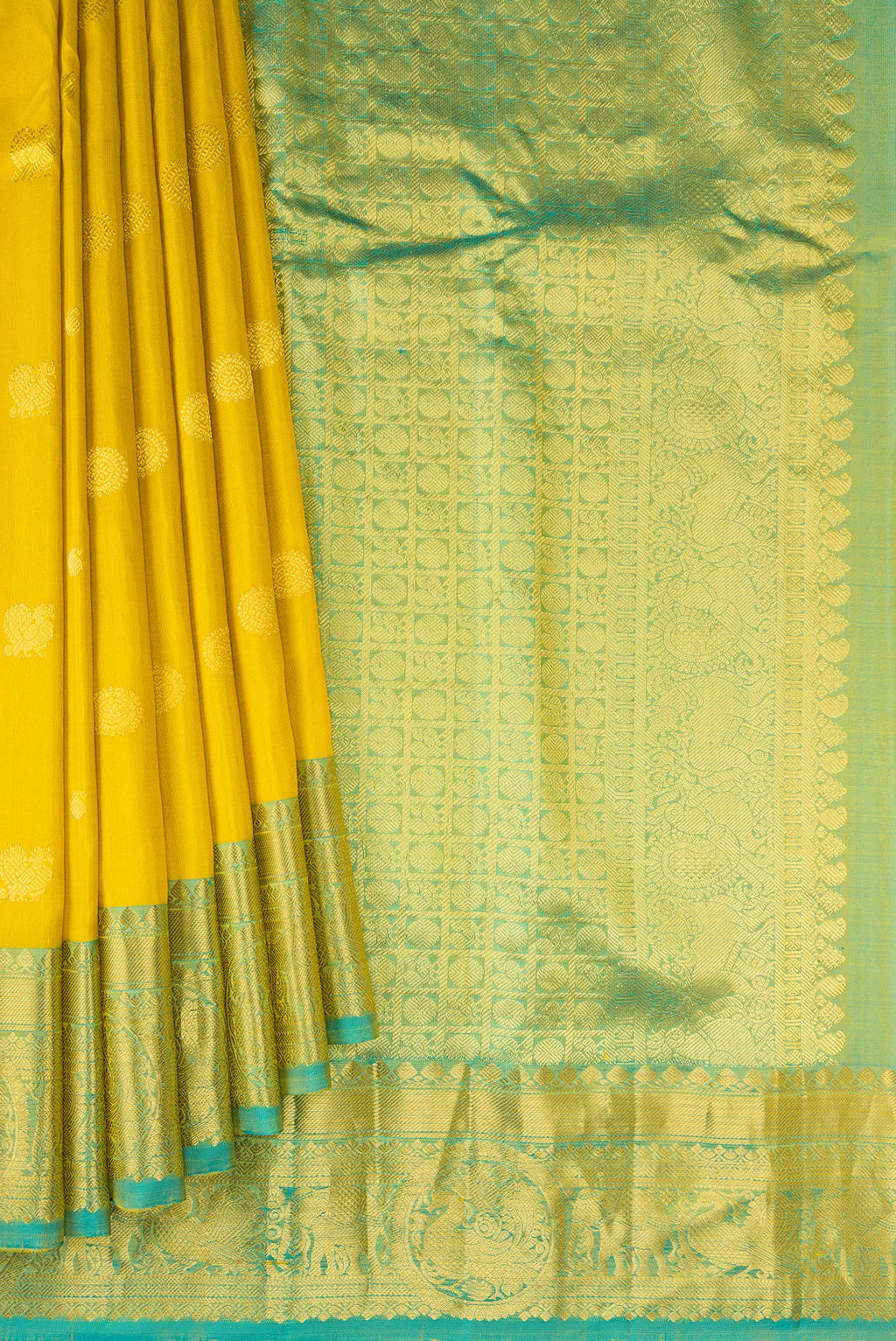 Pleats and pallu of Yellow Gadwal Silk Saree with Zari Butta on the body and Temple Border. 