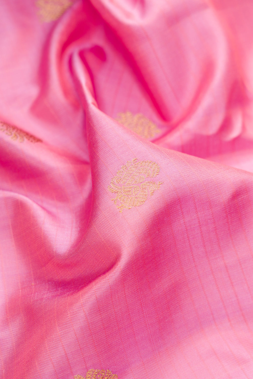 Close up of Pink Gadwal Silk Saree with Zari Butta on the body and Zari Border.  displaying folds