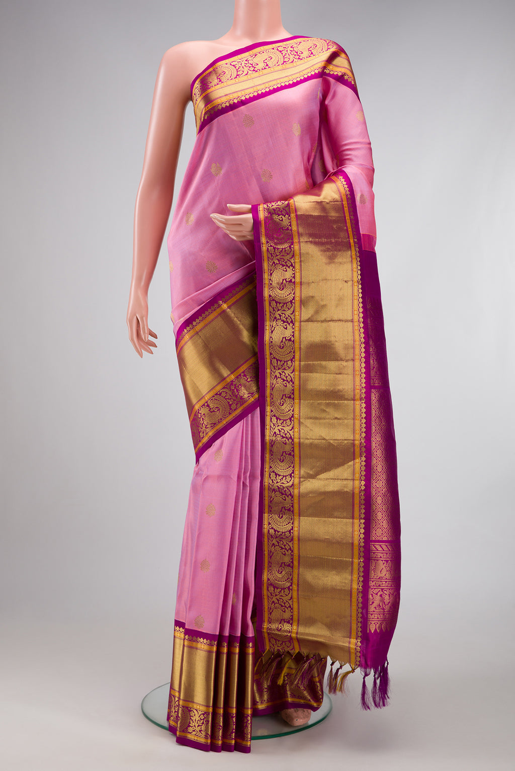 Pink Gadwal Silk Saree with Zari Butta on the body and Zari Border.  displayed on a mannequin