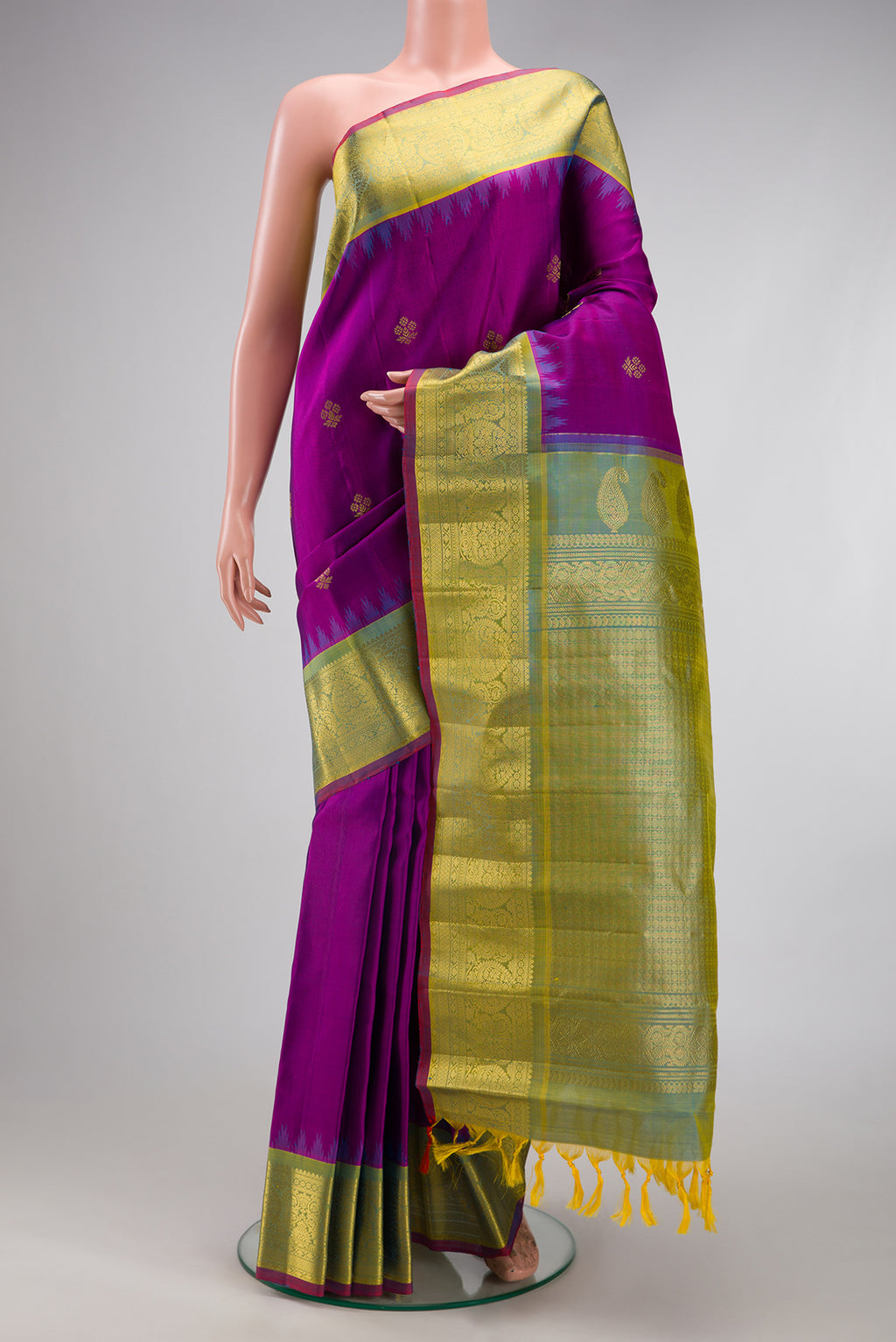 Purple Gadwal Silk Saree with Zari Butta on the body and Zari Border.  displayed on a mannequin