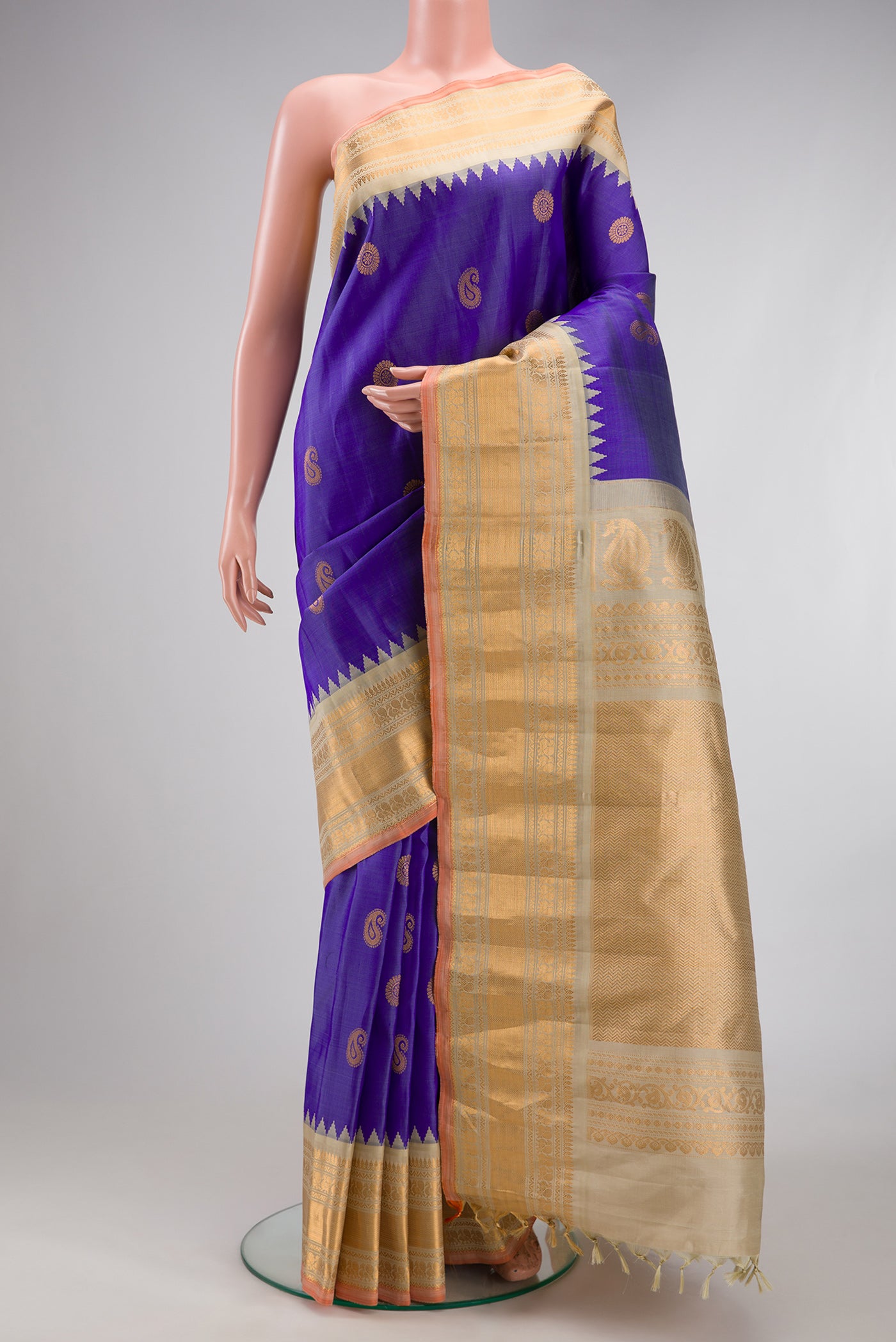 Blue Gadwal Silk Saree with Zari Butta on the body and Zari Border.  displayed on a mannequin