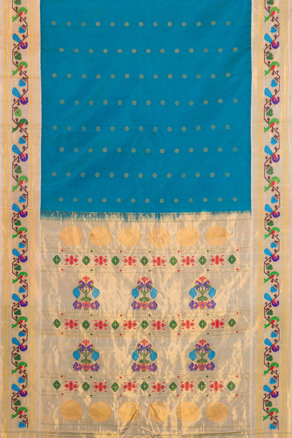 Flat view of Peacock Blue Paithani Silk Saree with Zari Butta on the body and Paithani Border. 