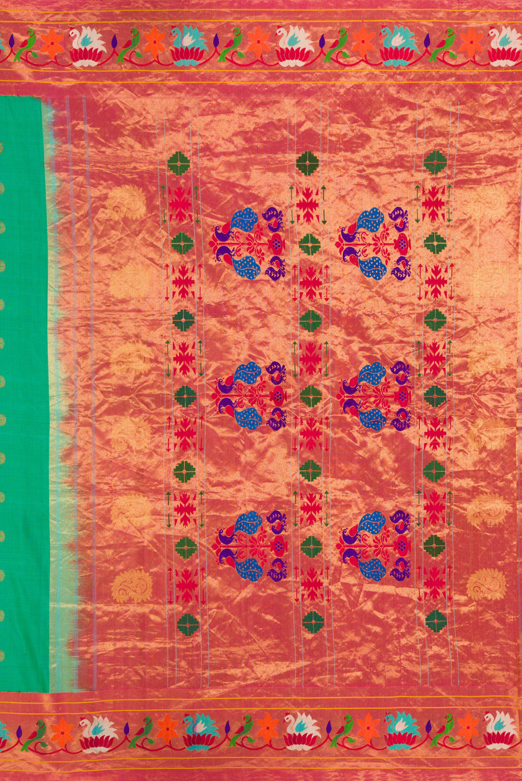 Close up image of the pallu of Sea Green Paithani Silk Saree with Zari Butta on the body and Paithani Border. 