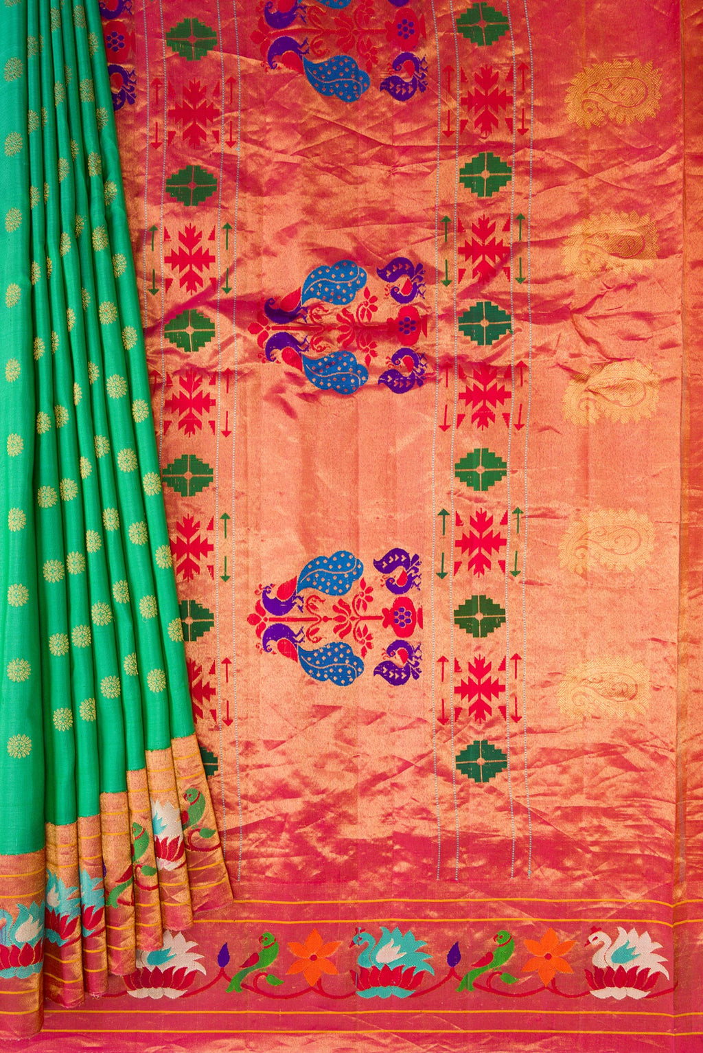 Pleats and pallu of Sea Green Paithani Silk Saree with Zari Butta on the body and Paithani Border. 