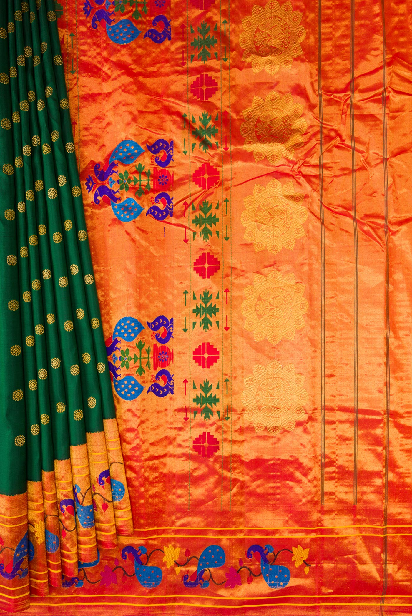 Pleats and pallu of Bottle Green Paithani Silk Saree with Zari Butta on the body and Paithani Border. 