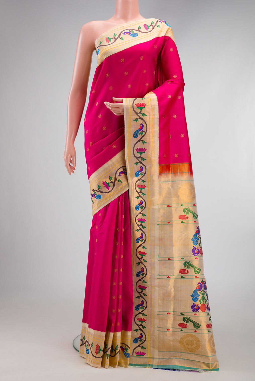 Dark Pink Paithani Silk Saree with Zari Butta on the body and Paithani Border.  displayed on a mannequin