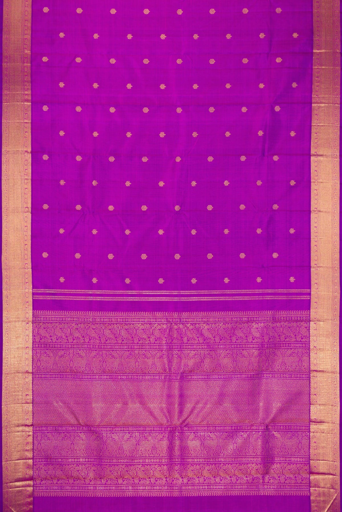 Flat view of Pure Silk Pure Zari Magenta Dual Tone Kanjivaram Saree with Zari Butta on the body and Zari Border. 