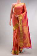 Pure Silk Pure Zari Coral Dual Tone Kanjivaram Saree with Zari Butta on the body and Zari Border.  displayed on a mannequin