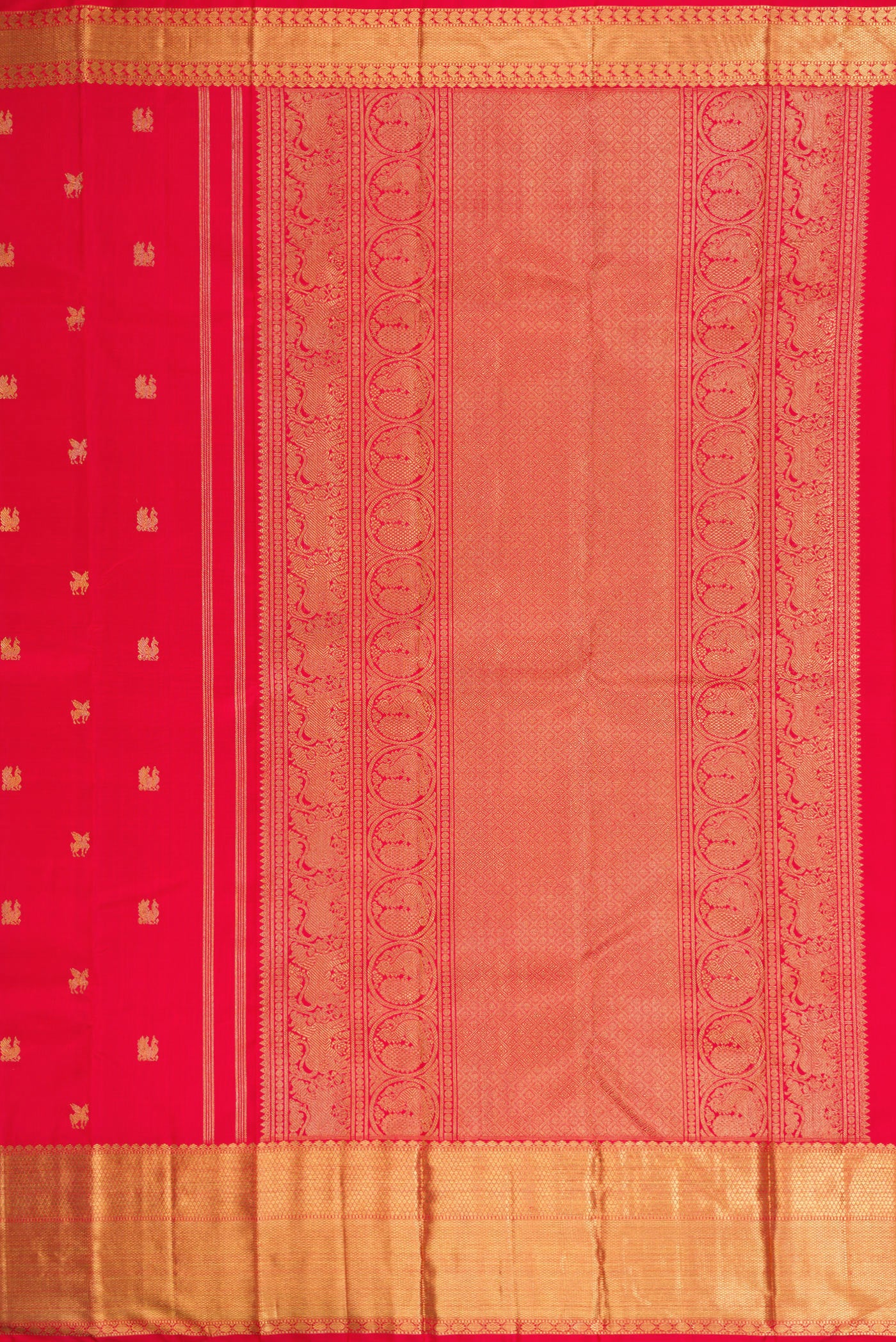 Close up image of the pallu of Pure Silk Pure Zari Red Dual Tone Kanjivaram Saree with Zari Butta on the body and Zari Border. 