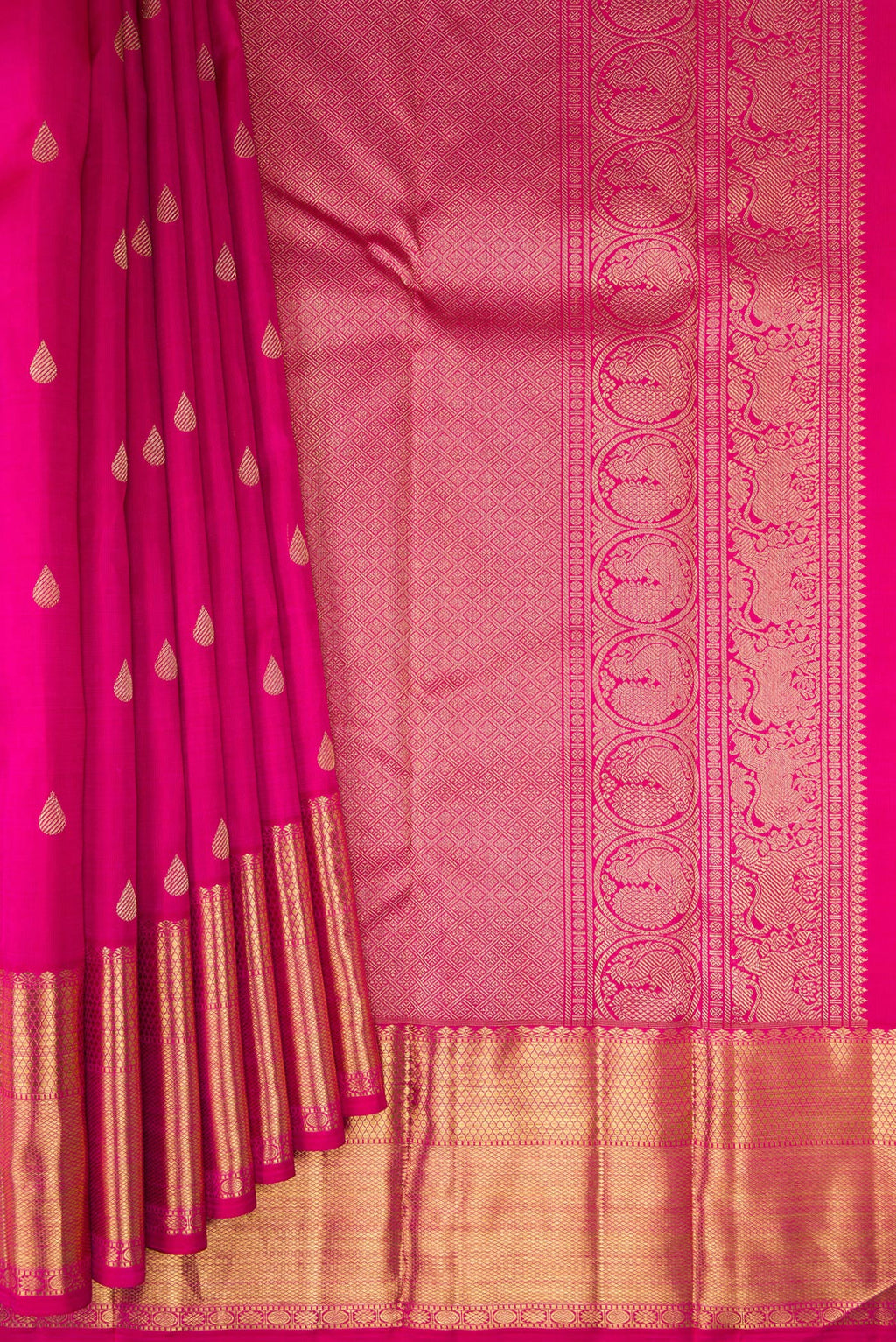 Pleats and pallu of Pure Silk Pure Zari Dark Pink Kanjivaram Saree with Zari Butta on the body and Zari Border. 
