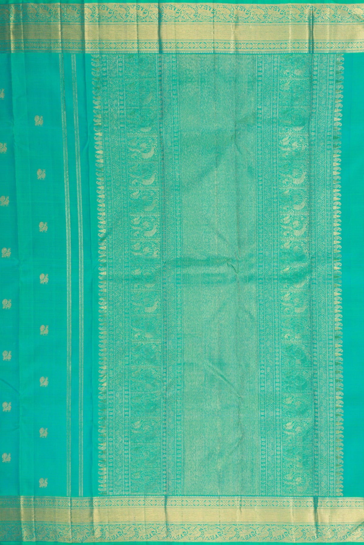 Close up image of the pallu of Pure Silk Pure Zari Turquoise Kanjivaram Saree with Zari Butta on the body and Zari Border. 