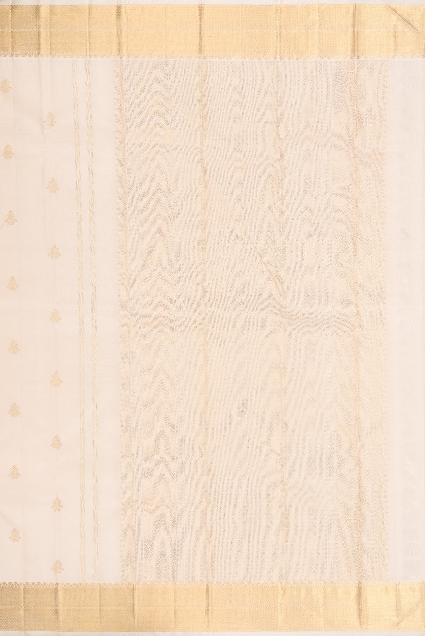 Close up image of the pallu of Pure Silk Pure Zari Off White Kanjivaram Saree with Zari Butta on the body and Zari Border. 