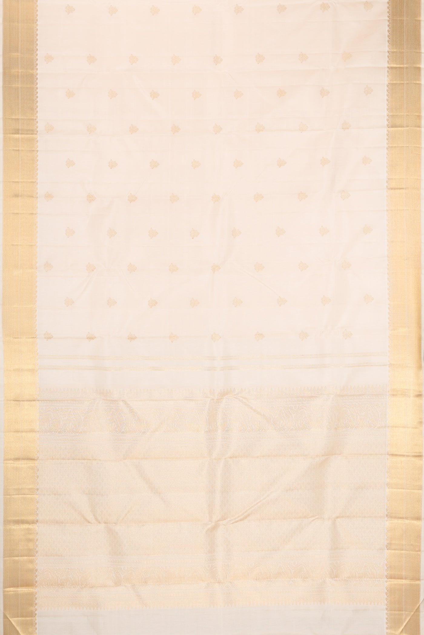 Flat view of Pure Silk Pure Zari Off White Kanjivaram Saree with Zari Butta on the body and Zari Border. 