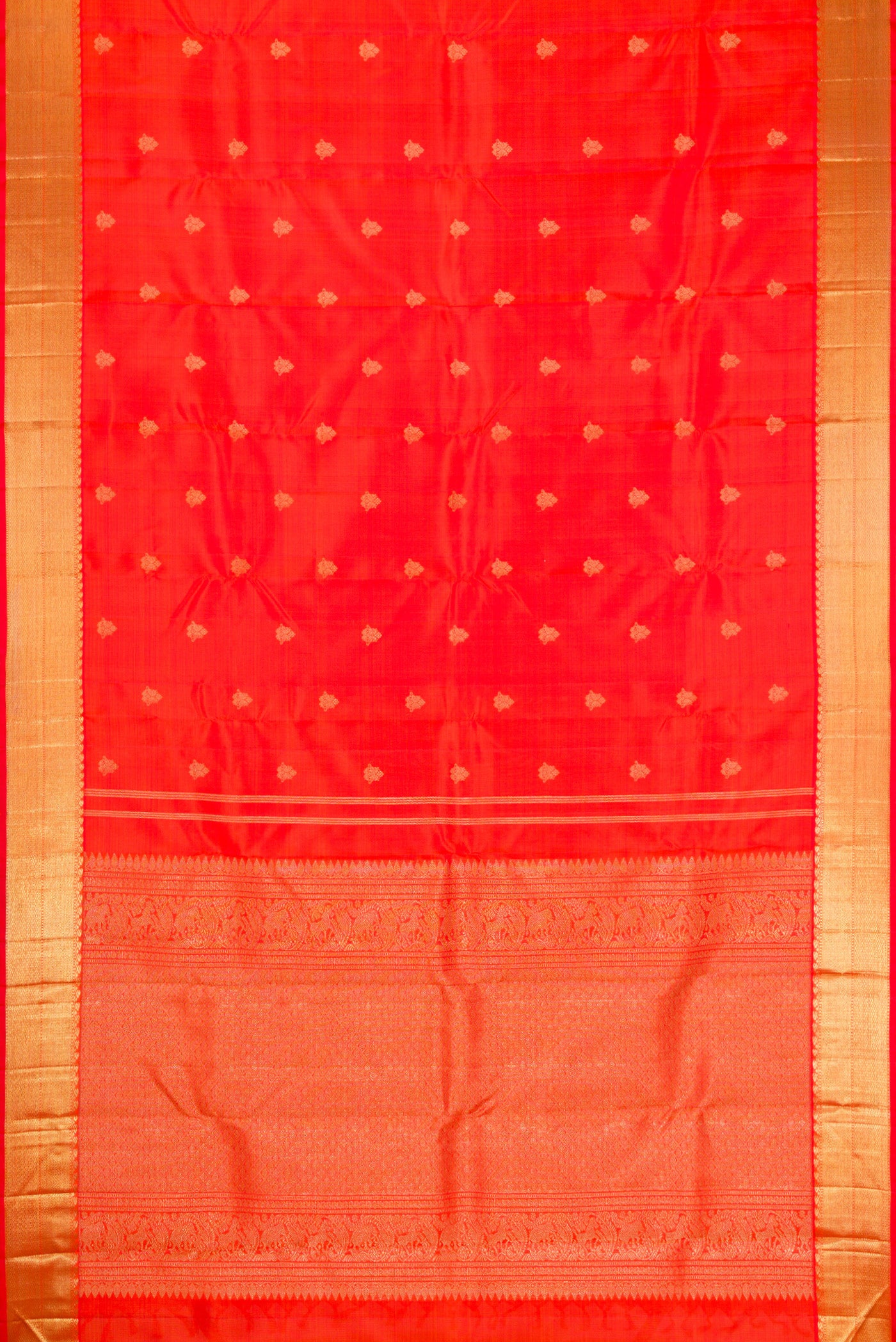 Flat view of Pure Silk Pure Zari Orange Dual Tone Kanjivaram Saree with Zari Butta on the body and Zari Border. 