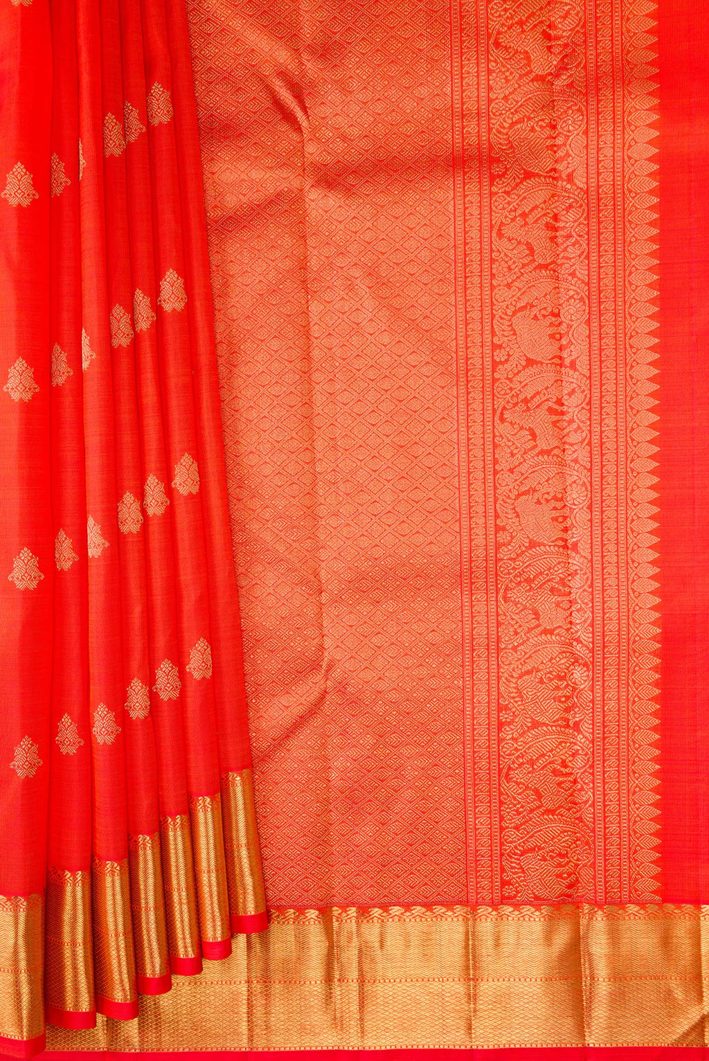 Pleats and pallu of Pure Silk Pure Zari Orange Dual Tone Kanjivaram Saree with Zari Butta on the body and Zari Border. 