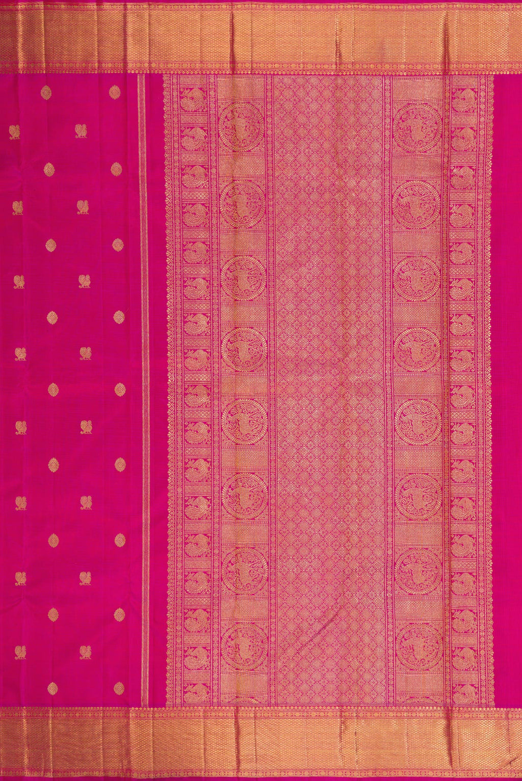 Close up image of the pallu of Pure Silk Pure Zari Magenta Kanjivaram Saree with Zari Butta on the body and Zari Border. 