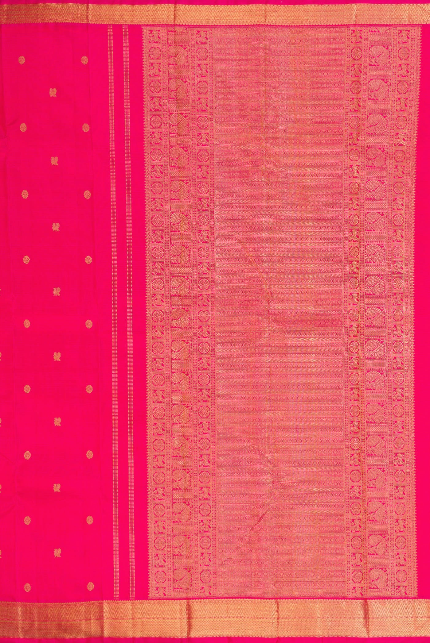 Close up image of the pallu of Pure Silk Pure Zari Pink Kanchipuram Saree with Zari Butta on the body and Zari Border. 