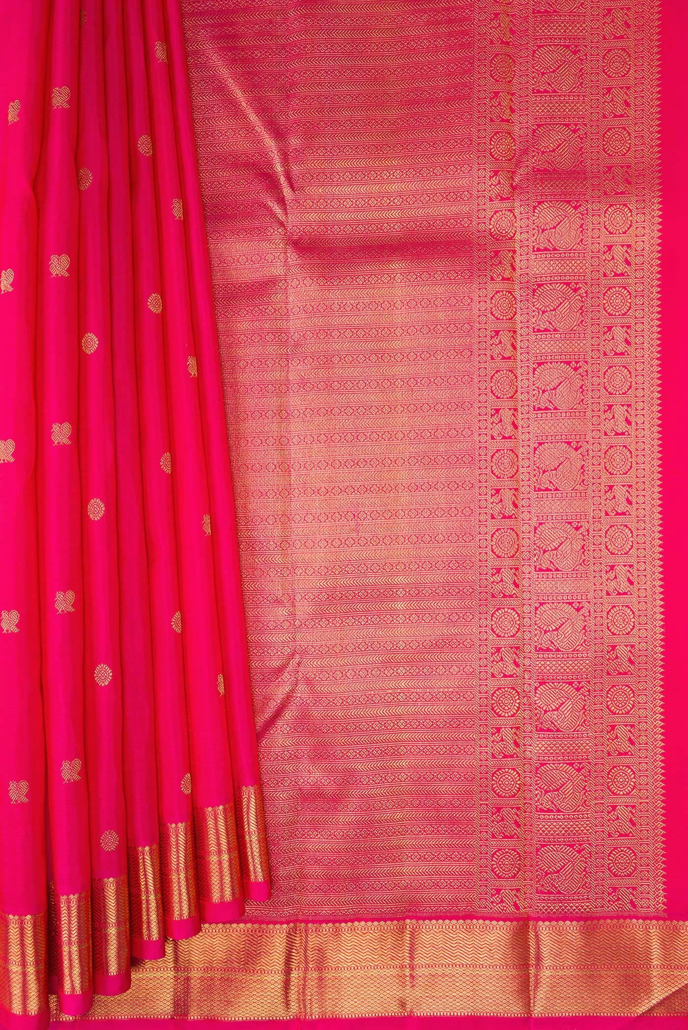 Pleats and pallu of Pure Silk Pure Zari Pink Kanchipuram Saree with Zari Butta on the body and Zari Border. 