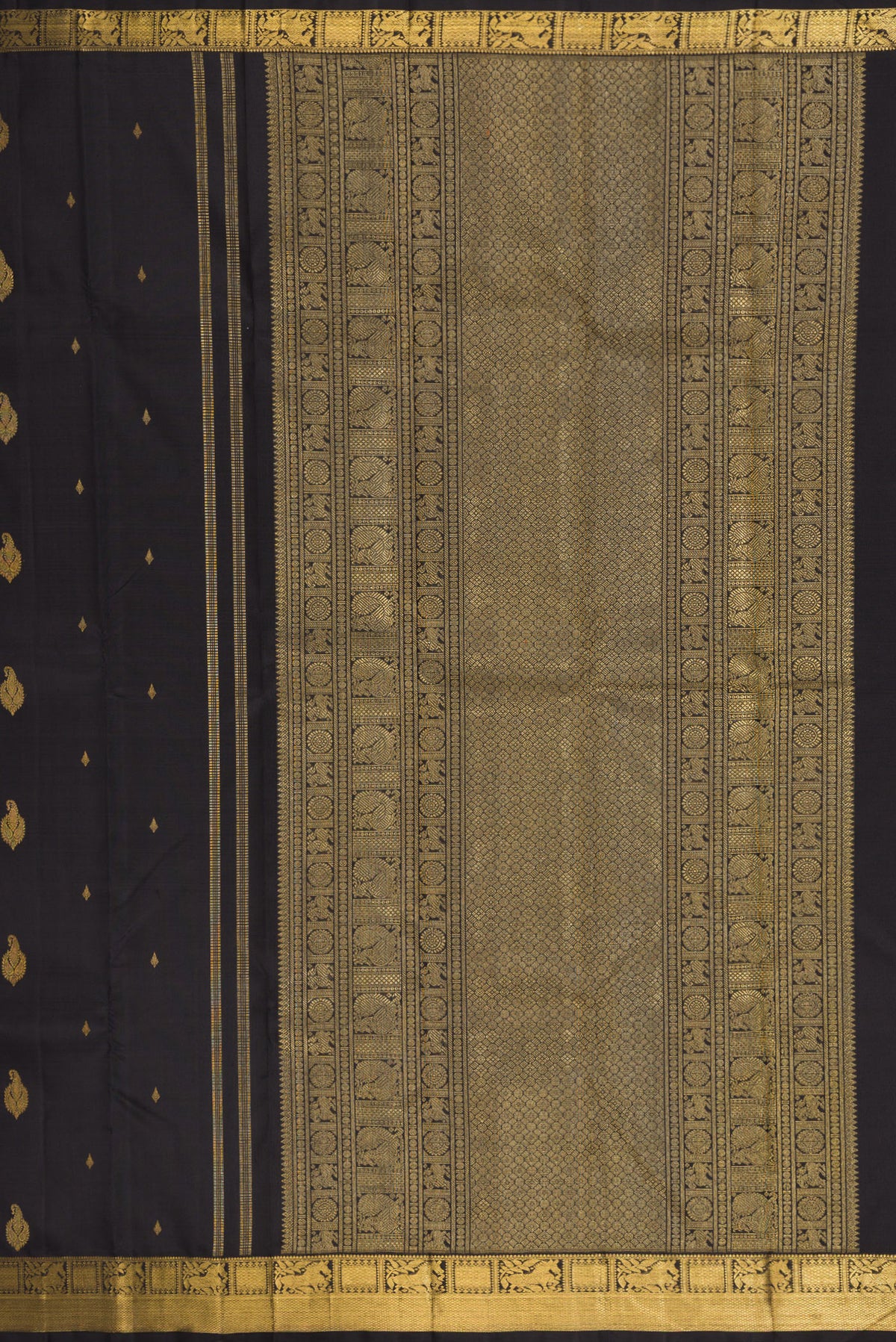 Close up image of the pallu of Black Kanchipuram Silk Saree with Zari Butta on the body and Zari Border. 