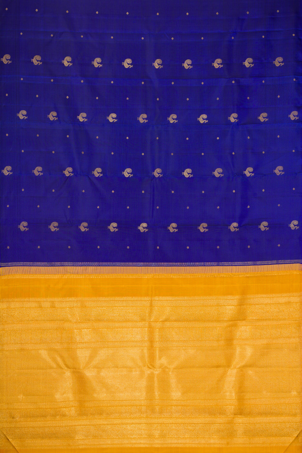 Flat view of Pure Silk Pure Zari Royal Blue Kanchipuram Saree with Zari Butta on the body and Without Border. 