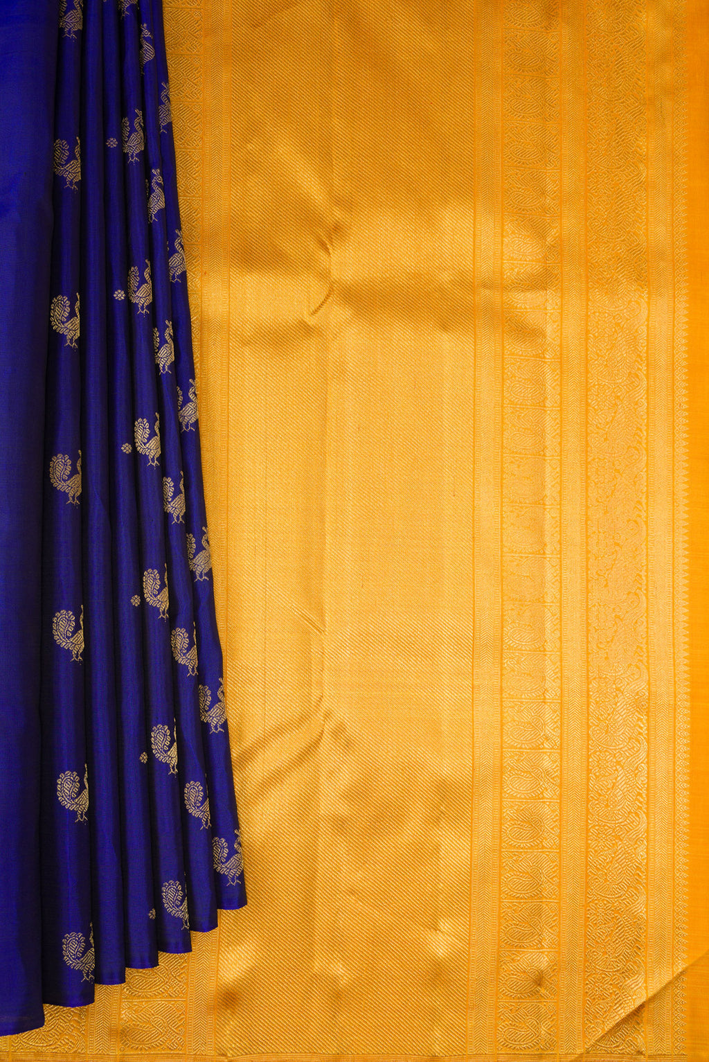 Pleats and pallu of Pure Silk Pure Zari Royal Blue Kanchipuram Saree with Zari Butta on the body and Without Border. 