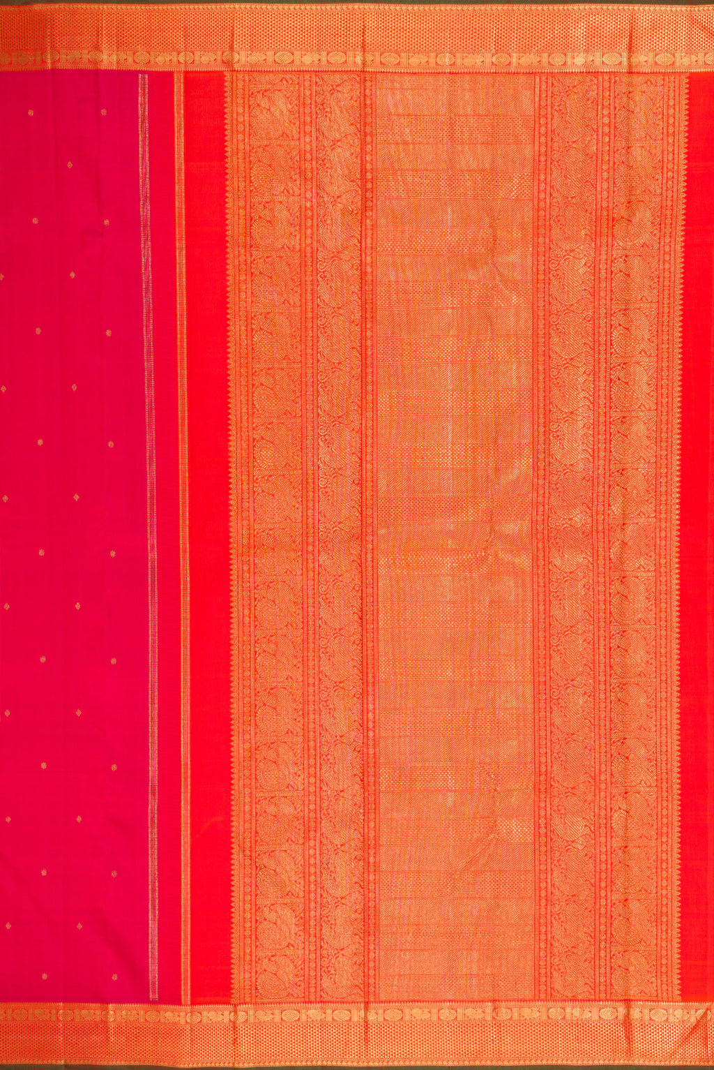 Close up image of the pallu of Pure Silk Pure Zari Pink Kanjivaram Saree with Zari Butta on the body and Zari Border. 