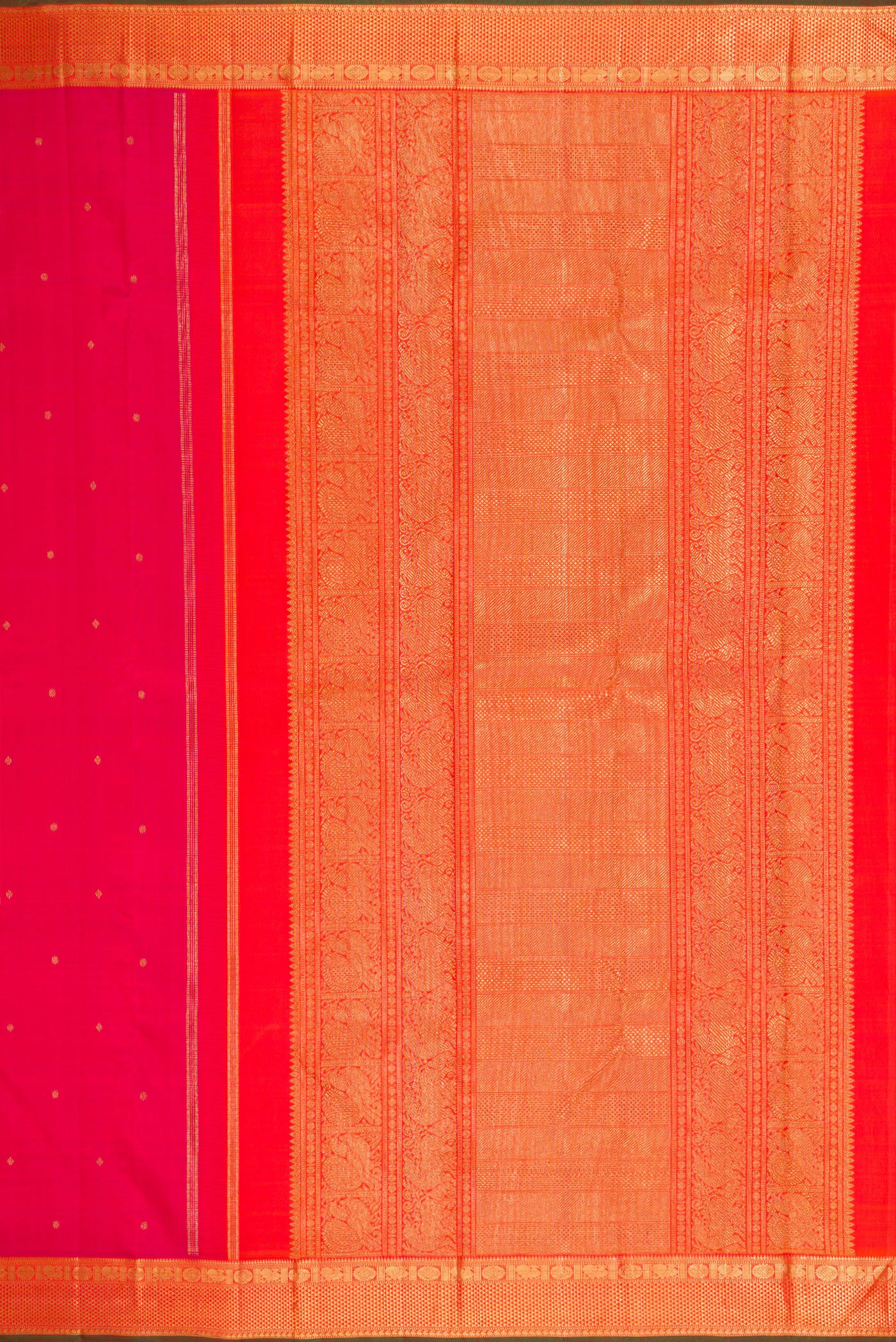 Close up image of the pallu of Pure Silk Pure Zari Pink Kanjivaram Saree with Zari Butta on the body and Zari Border. 