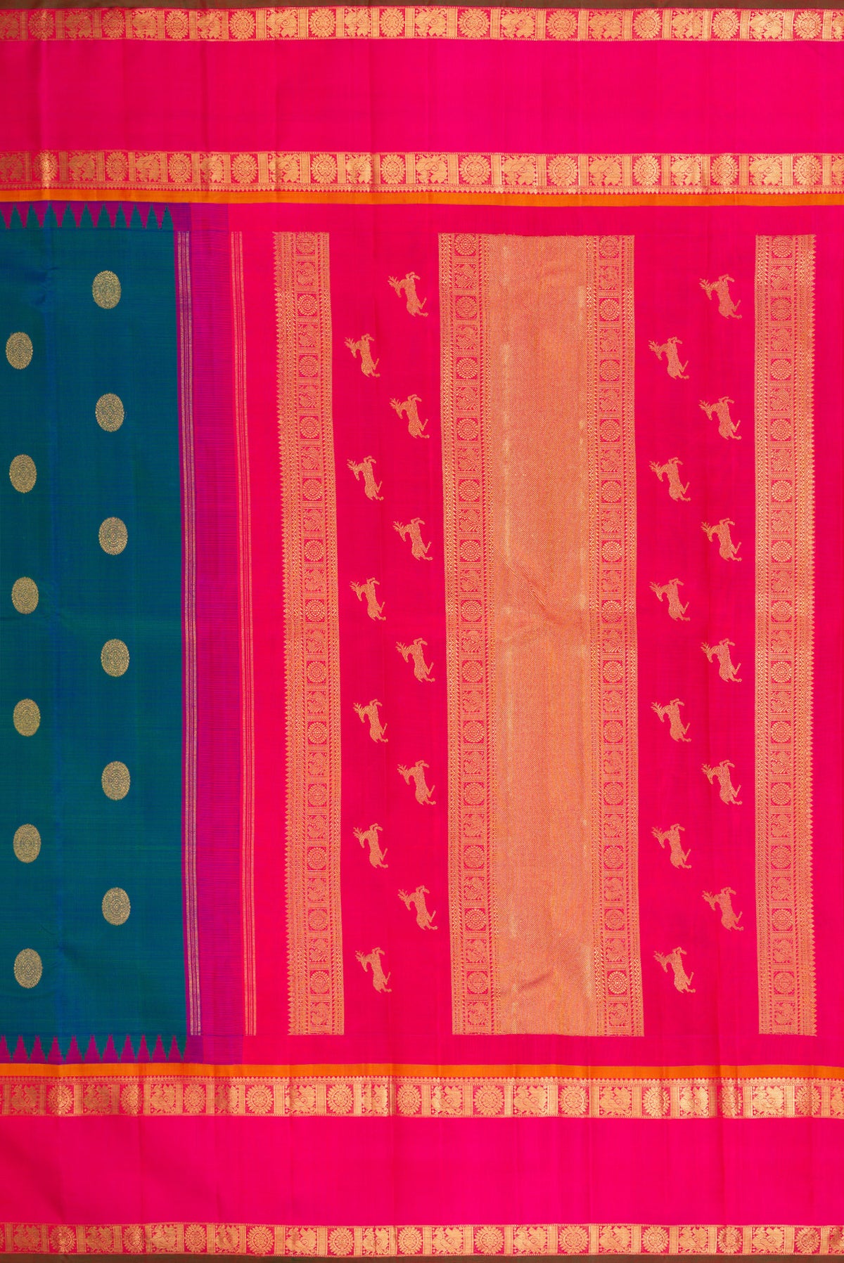 Close up image of the pallu of Pure Silk Pure Zari Peacock Blue Kanjivaram Saree with Zari Butta on the body and Zari Border. 
