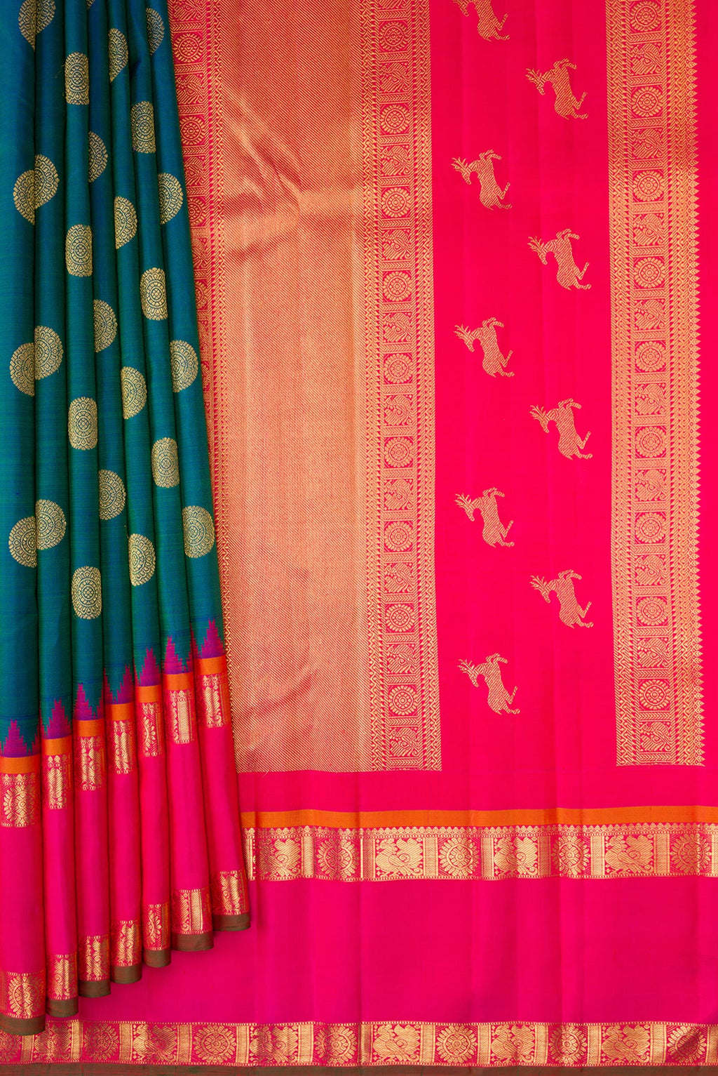 Pleats and pallu of Pure Silk Pure Zari Peacock Blue Kanjivaram Saree with Zari Butta on the body and Zari Border. 