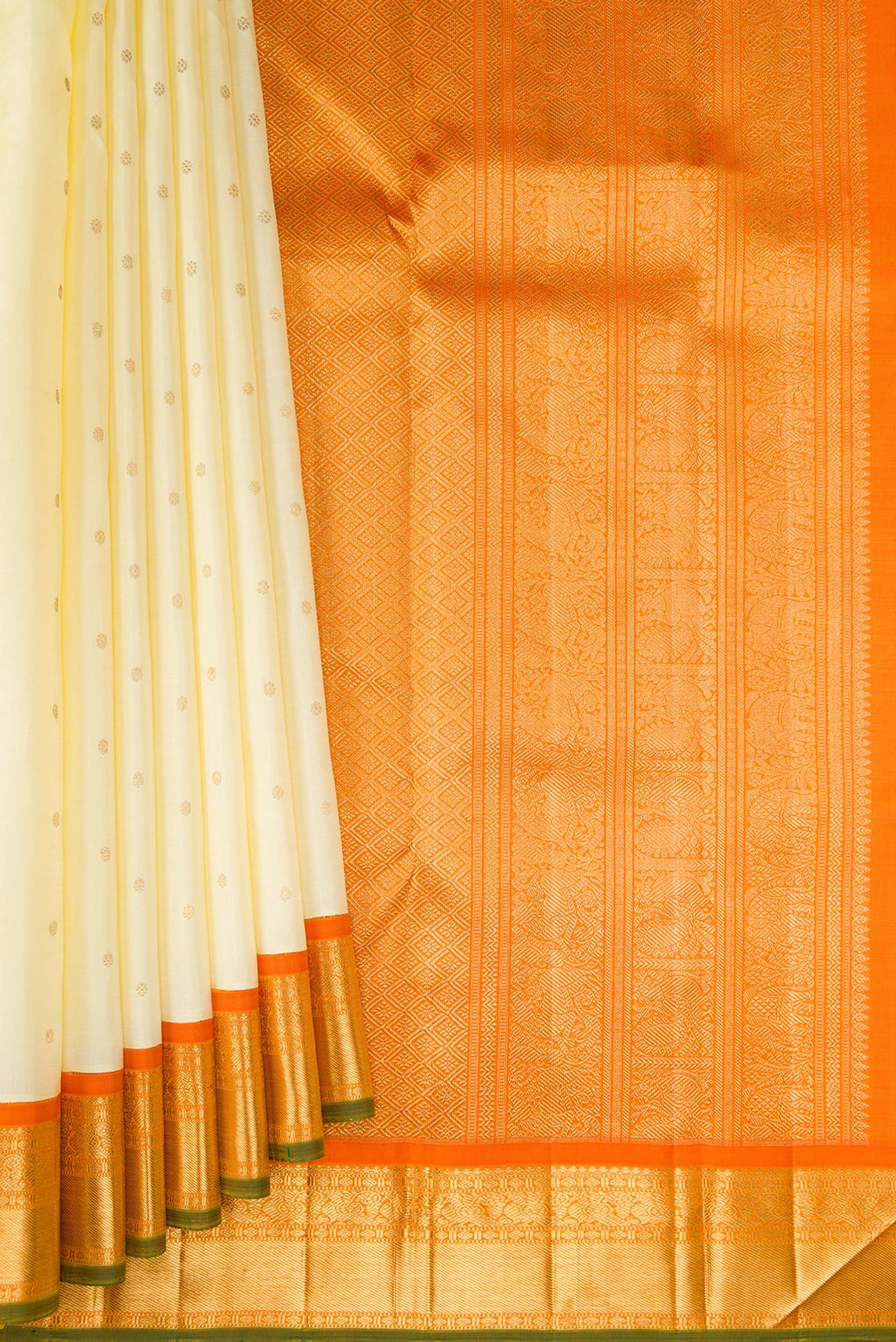 Pleats and pallu of Pure Silk Pure Zari Cream Kanjivaram Saree with Zari Butta on the body and Zari Border. 