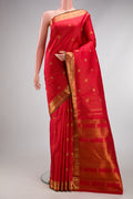 Pure Silk Pure Zari Dark Pink Dual Tone Kanjivaram Saree with Checked design on the body and Zari Border.  displayed on a mannequin
