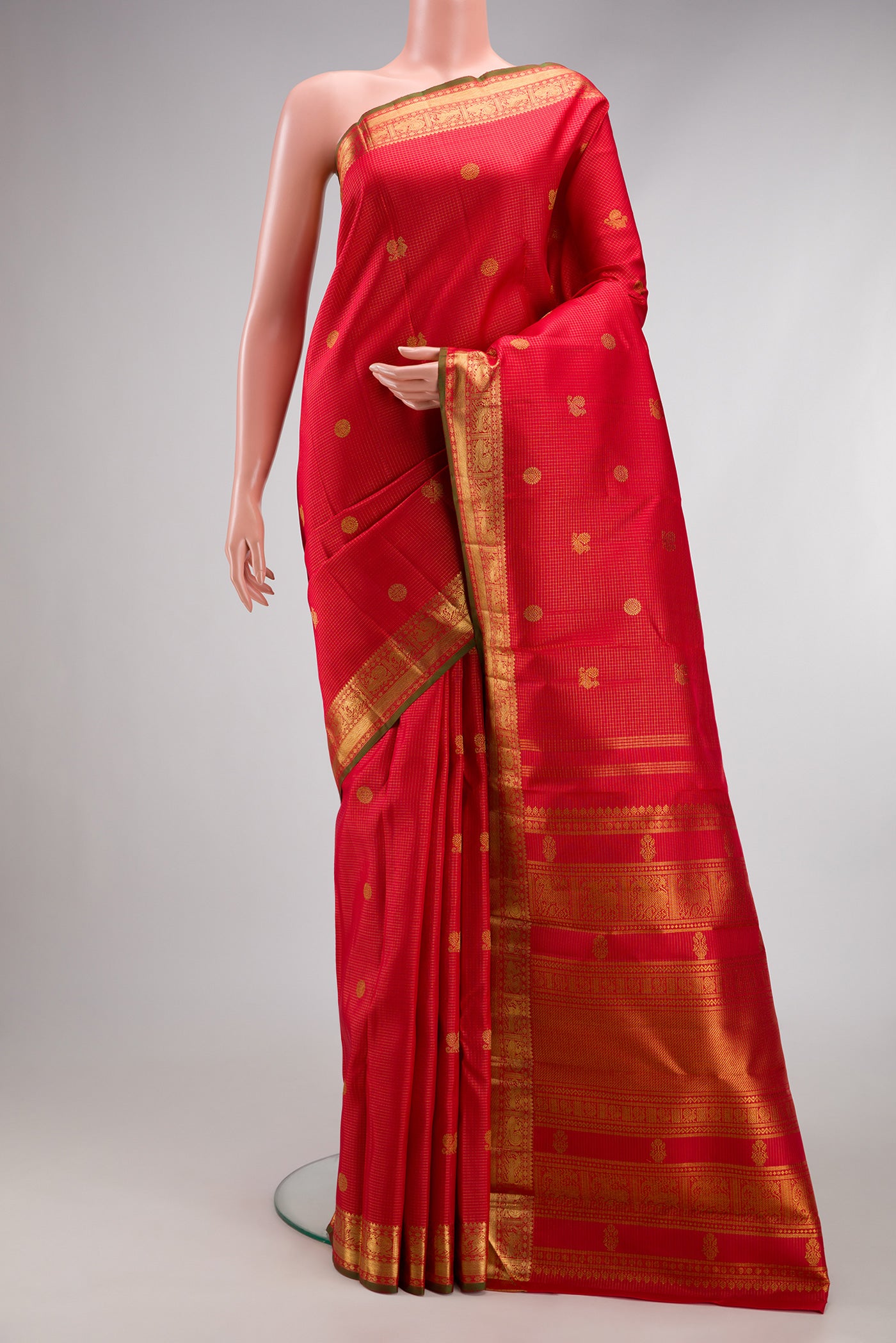 Pure Silk Pure Zari Dark Pink Dual Tone Kanjivaram Saree with Checked design on the body and Zari Border.  displayed on a mannequin