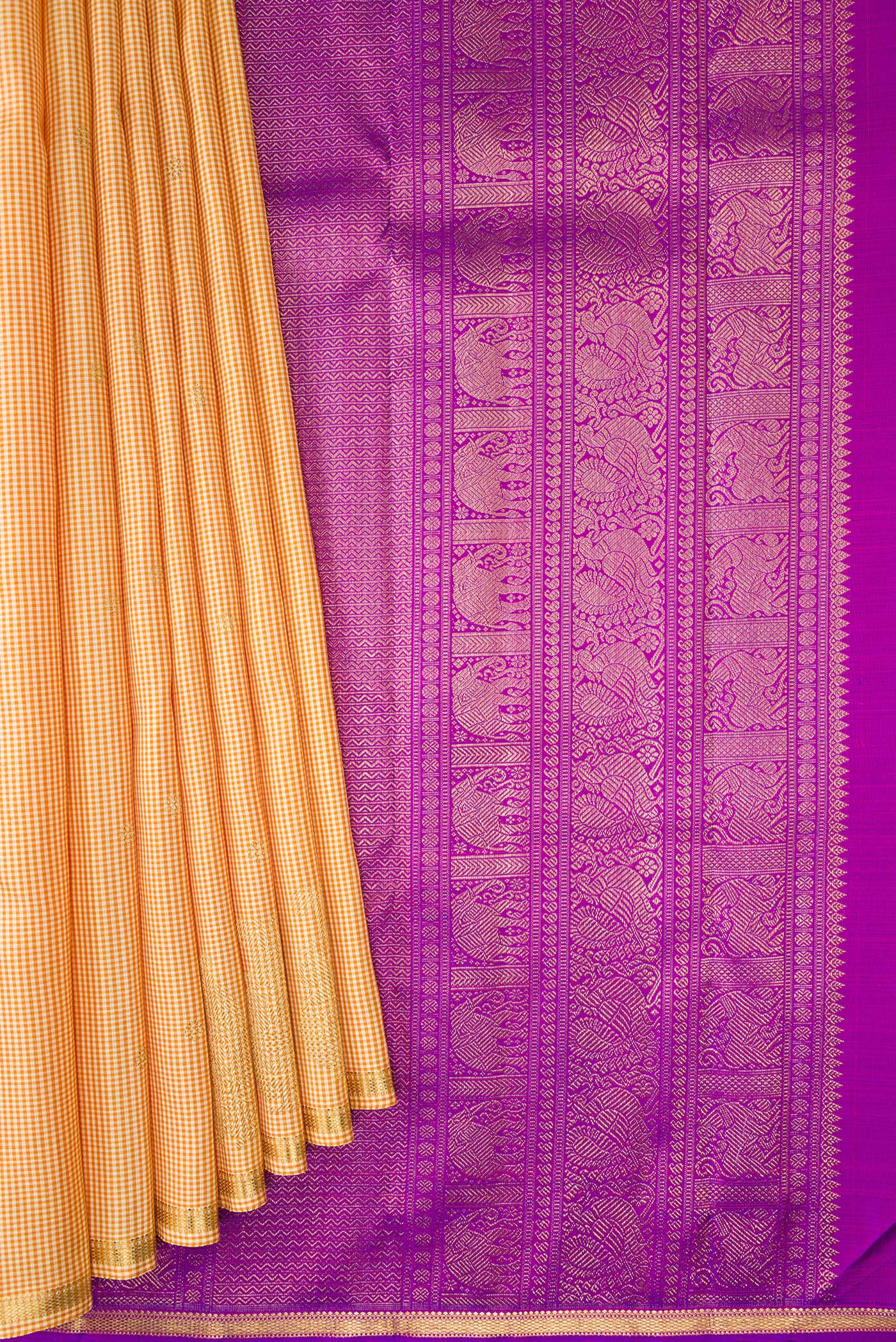 Pleats and pallu of Pure Silk Pure Zari Sandal Kanchipuram Saree with Checked design on the body and Zari Border. 