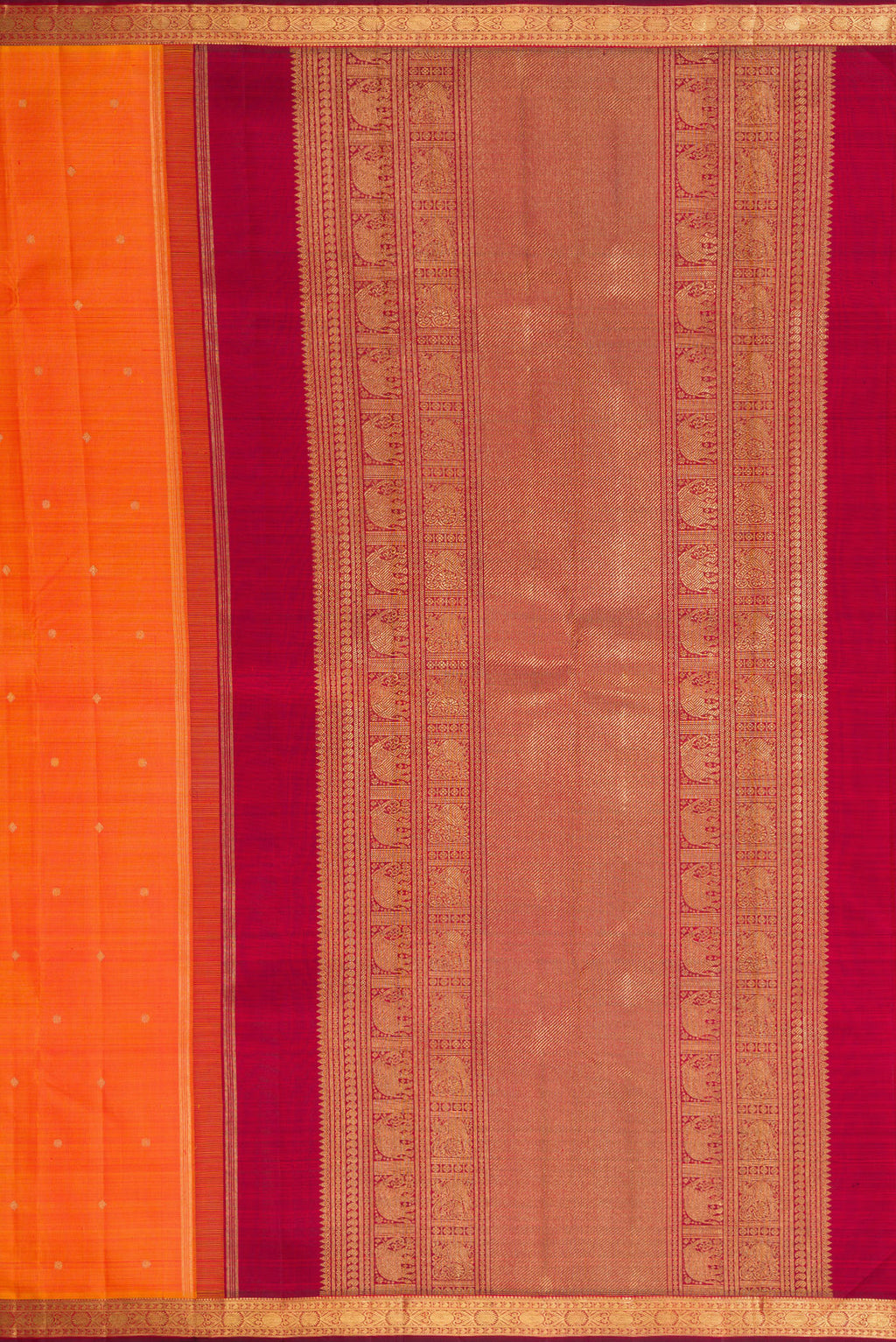Close up image of the pallu of Orange Dual Tone Kanchipuram Silk Saree with Zari Butta on the body and Zari Border. 