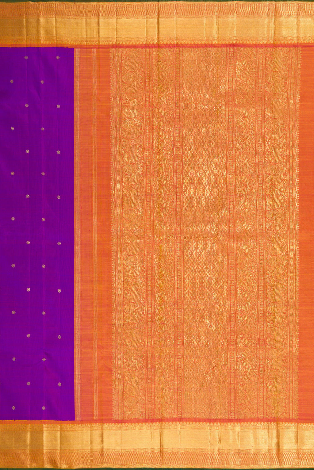 Close up image of the pallu of Pure Silk Pure Zari Purple Dual Tone Kanjivaram Saree with Zari Butta on the body and Zari Border. 